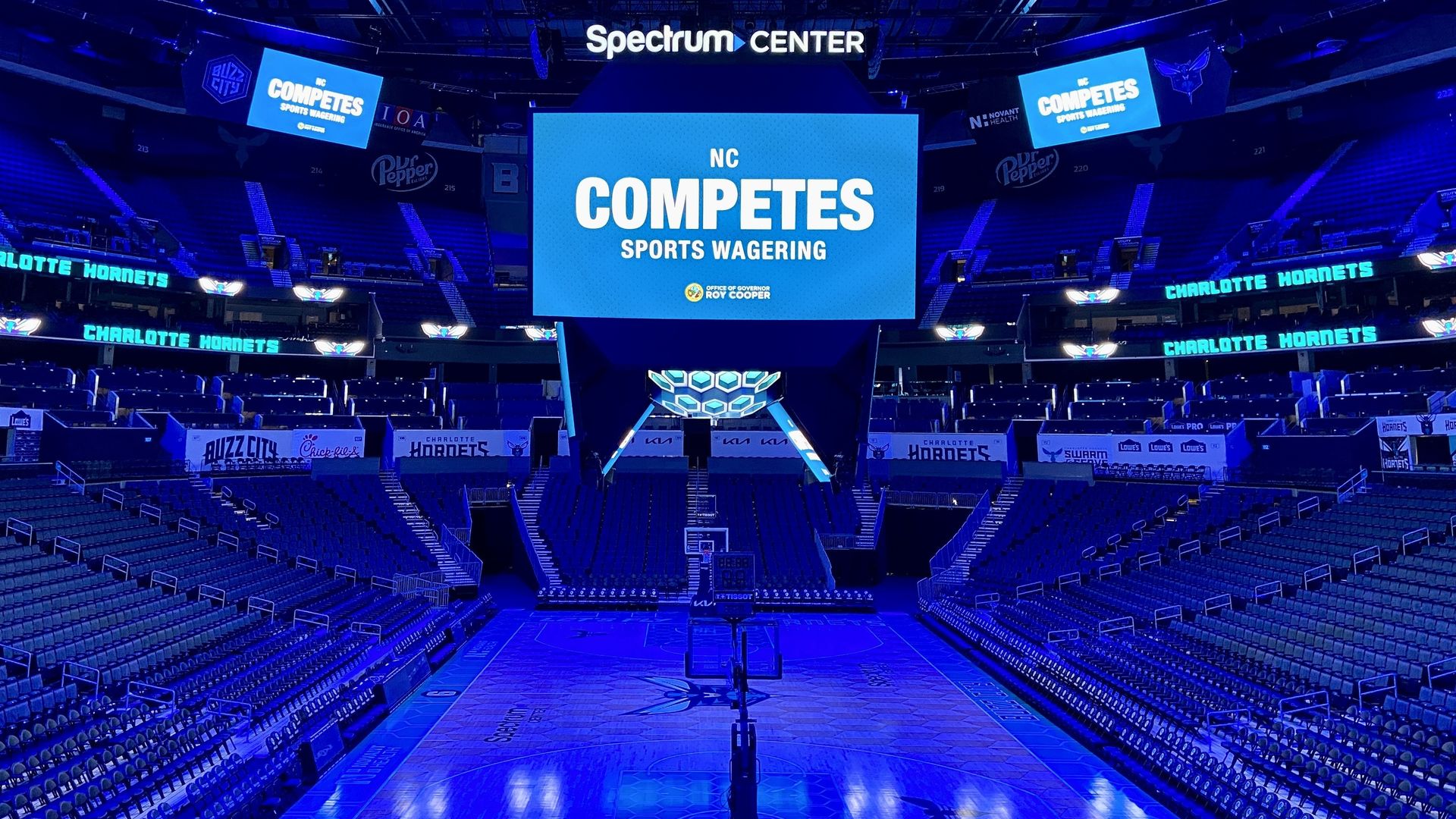 Spectrum Center's court decorated to celebrate sports betting. 