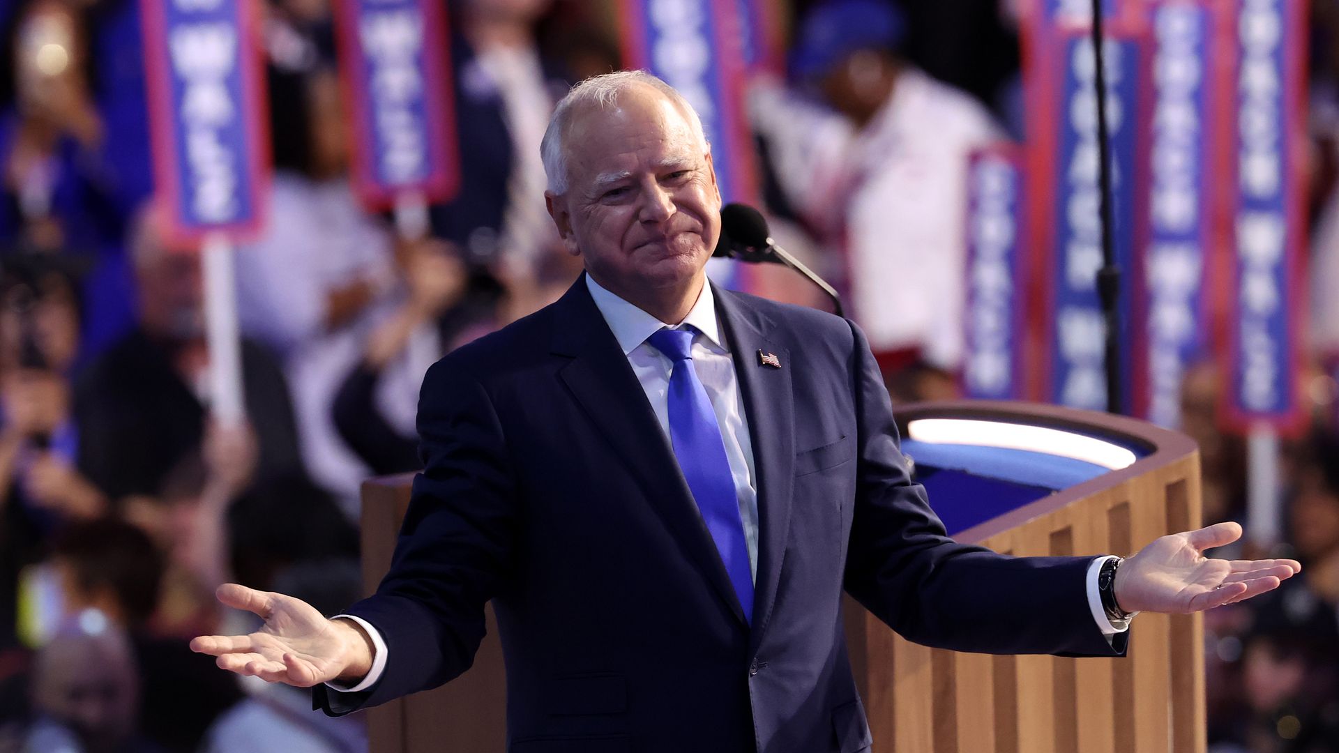 Democratic vice presidential nominee Minnesota Gov. Tim Walz reacts after accepting the vice presidential nomination during the third day of the Democratic National Convention at the United Center on August 21, 2024 in Chicago, Illinois. 