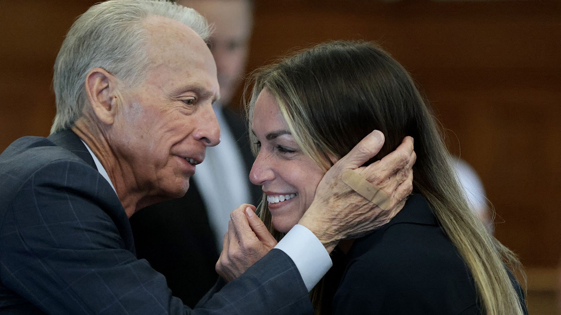 A man and woman embrace