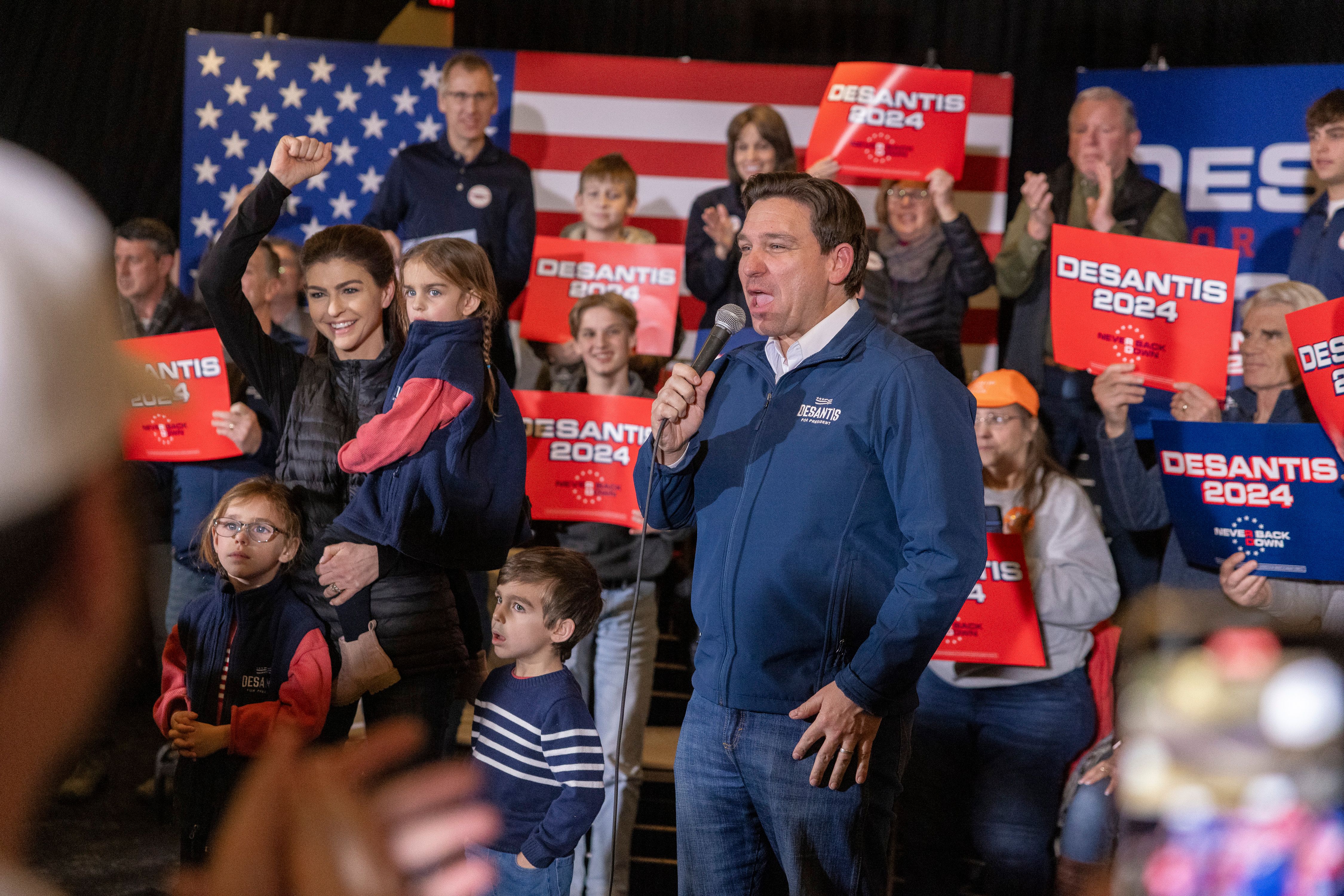  Ron DeSantis, governor of Florida and 2024 Republican presidential candidate, center, during a campaign event at The District Venue in Ankeny, Iowa, US, on Sunday, Jan. 14, 2024. 