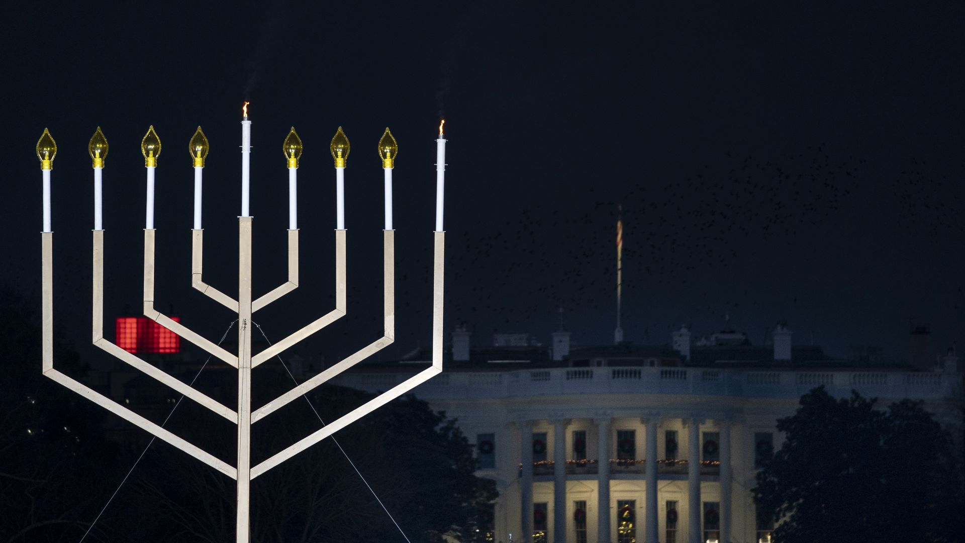 The National Menorah is lit against the White House on the first night of Hanukkah.