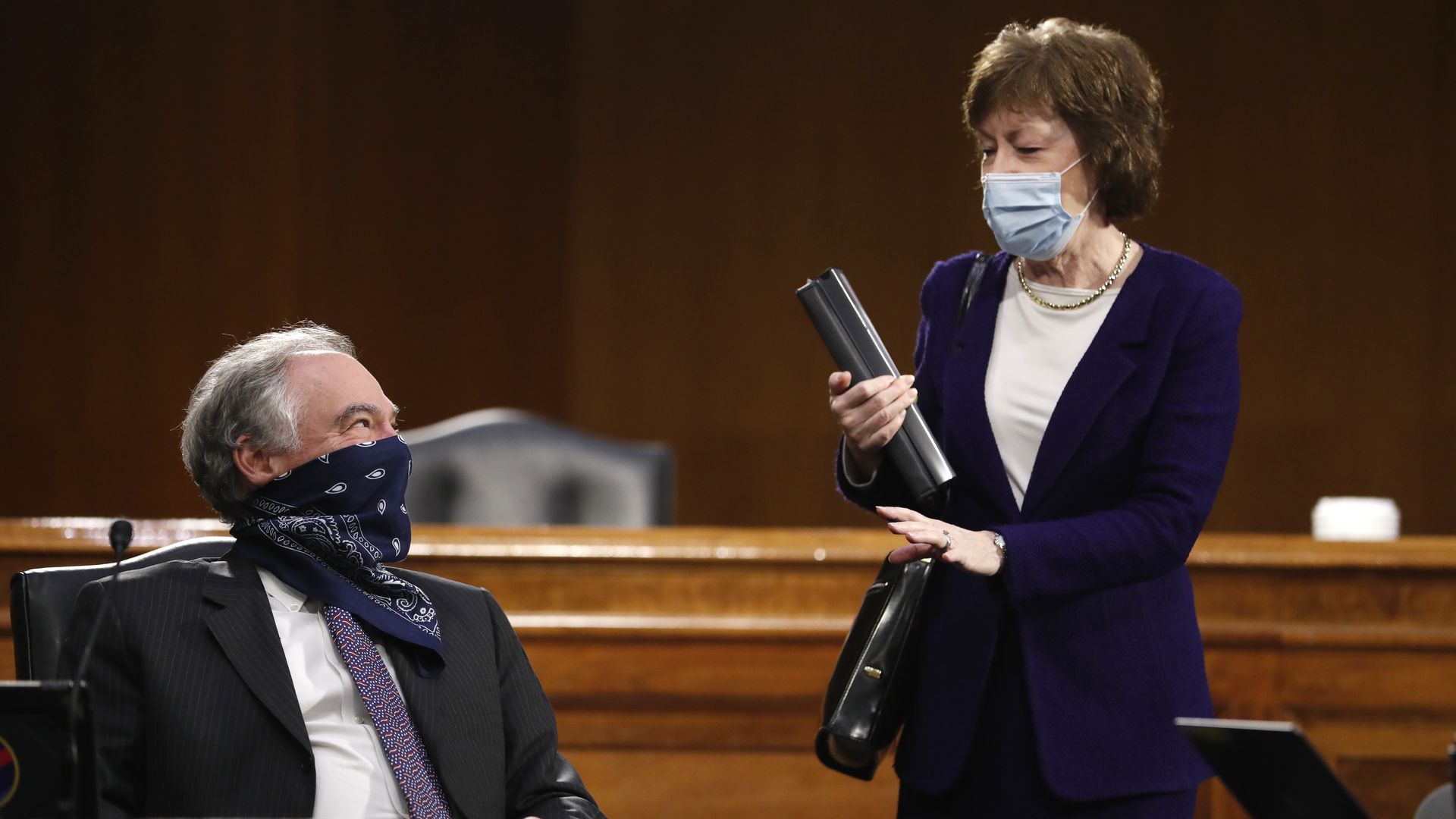 Sen. Tim Kaine, D-VA., speaks with Sen. Susan Collins, R-ME