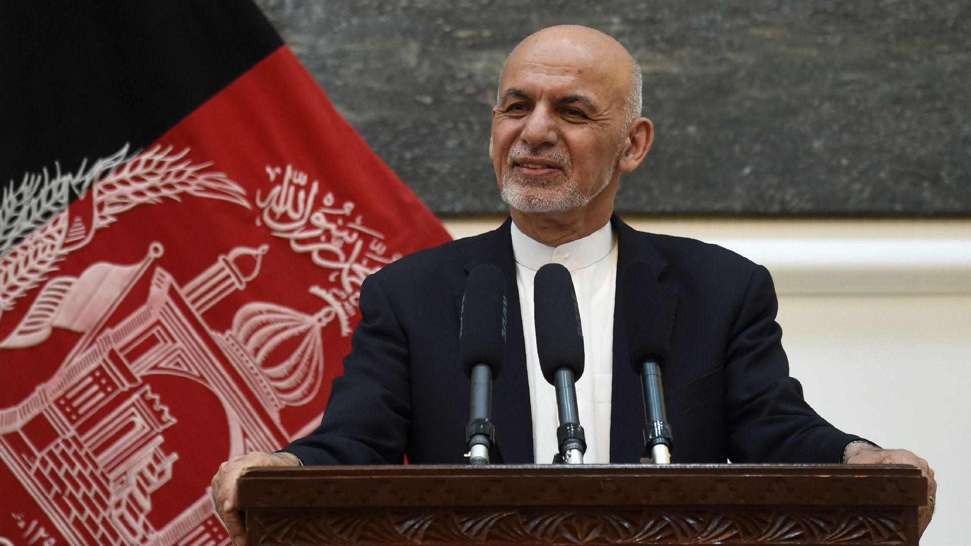 Afghan President Ashraf Ghani listens to US Secretary of State Mike Pompeo during a press conference at the Presidential Palace in Kabul