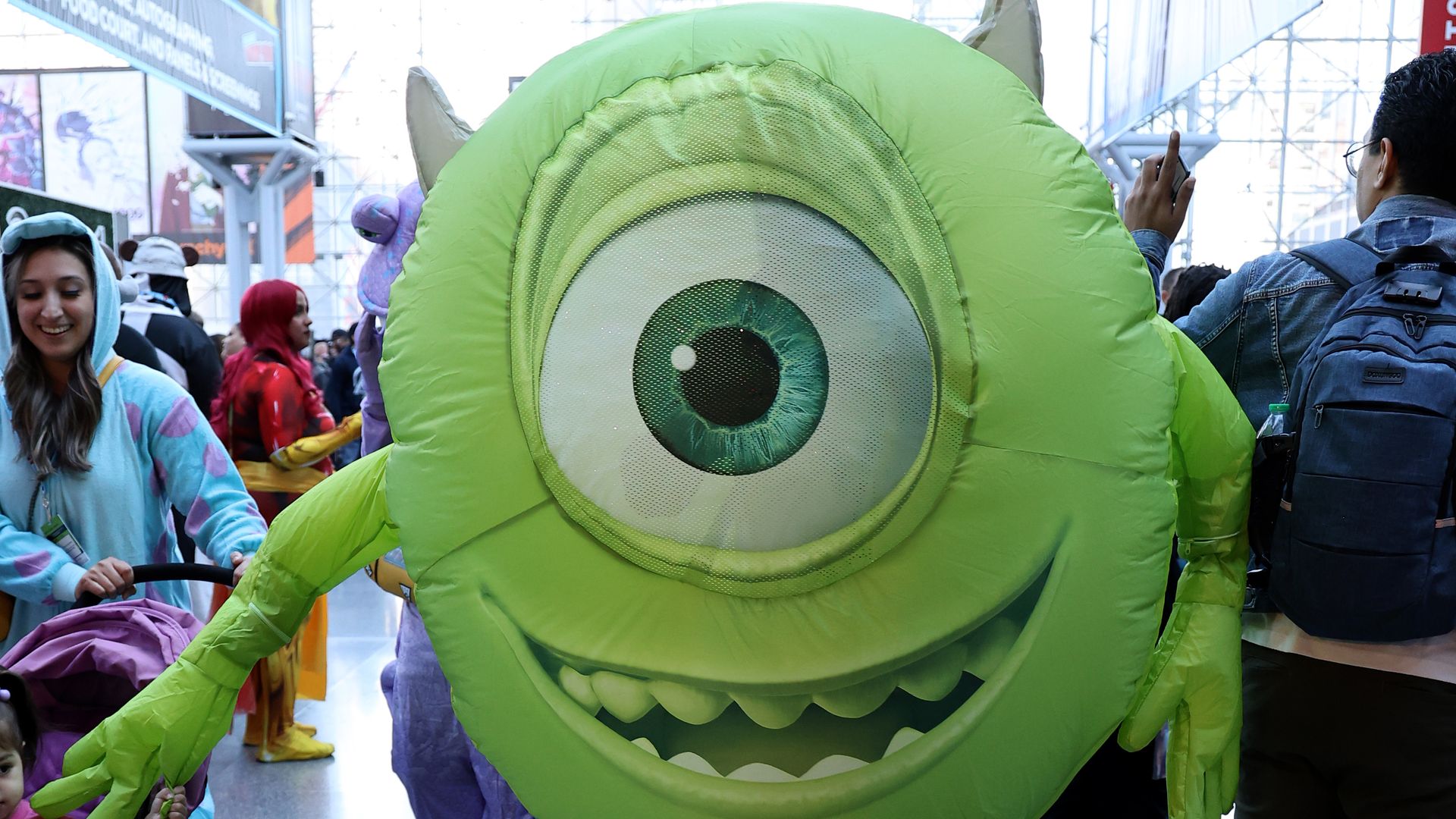 A cosplayer dressed as Mike Wazowski. Photo: Marleen Moise/Getty Images