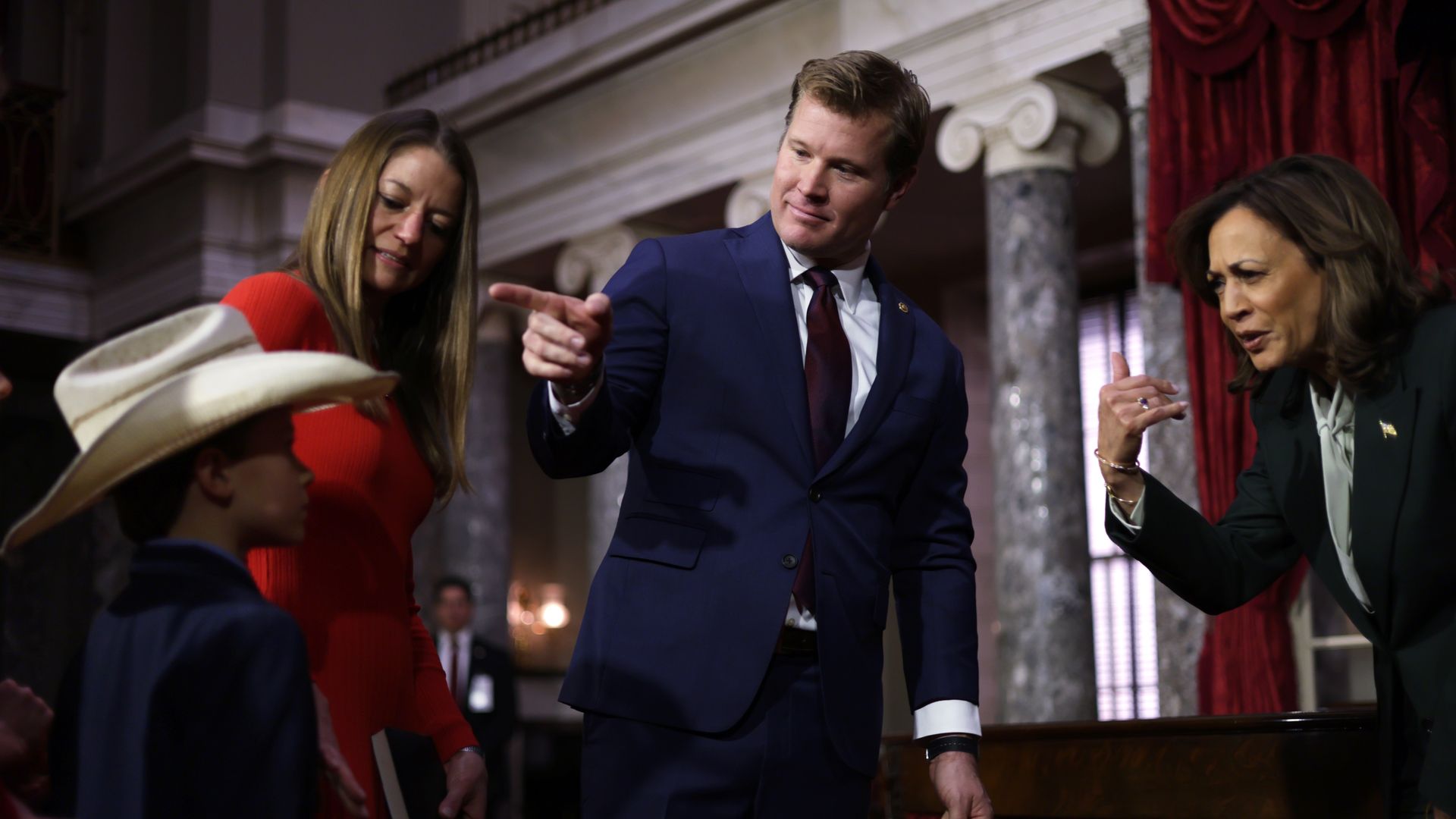  Sen. Tim Sheehy (R-MT) (C) introduces his family to Vice President Kamala Harris (R) during a ceremonial swearing-in at the U.S. Capitol 