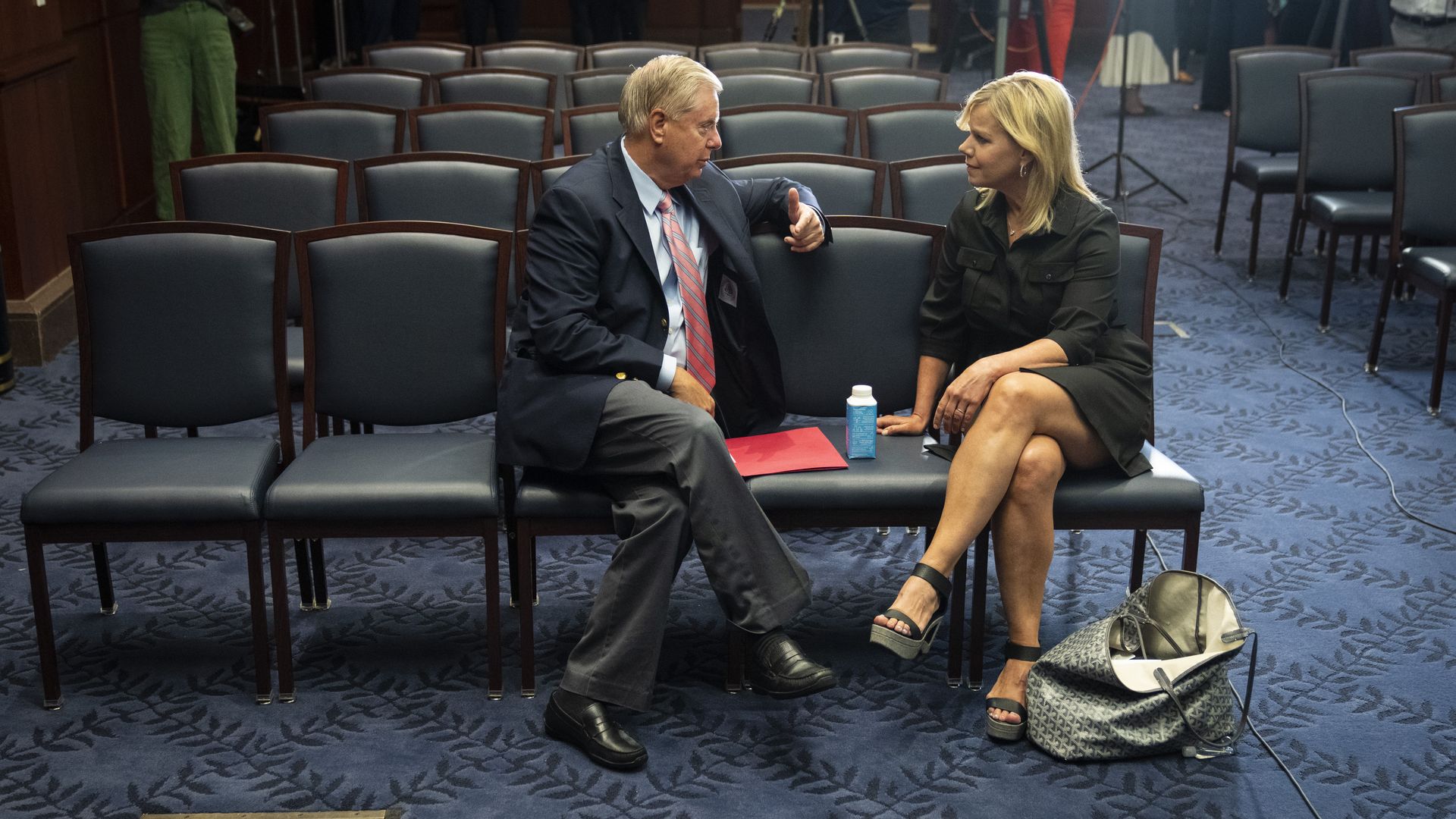 Former Fox employee Gretchen Carlson is seen speaking with Sen. Lindsey Graham last July.