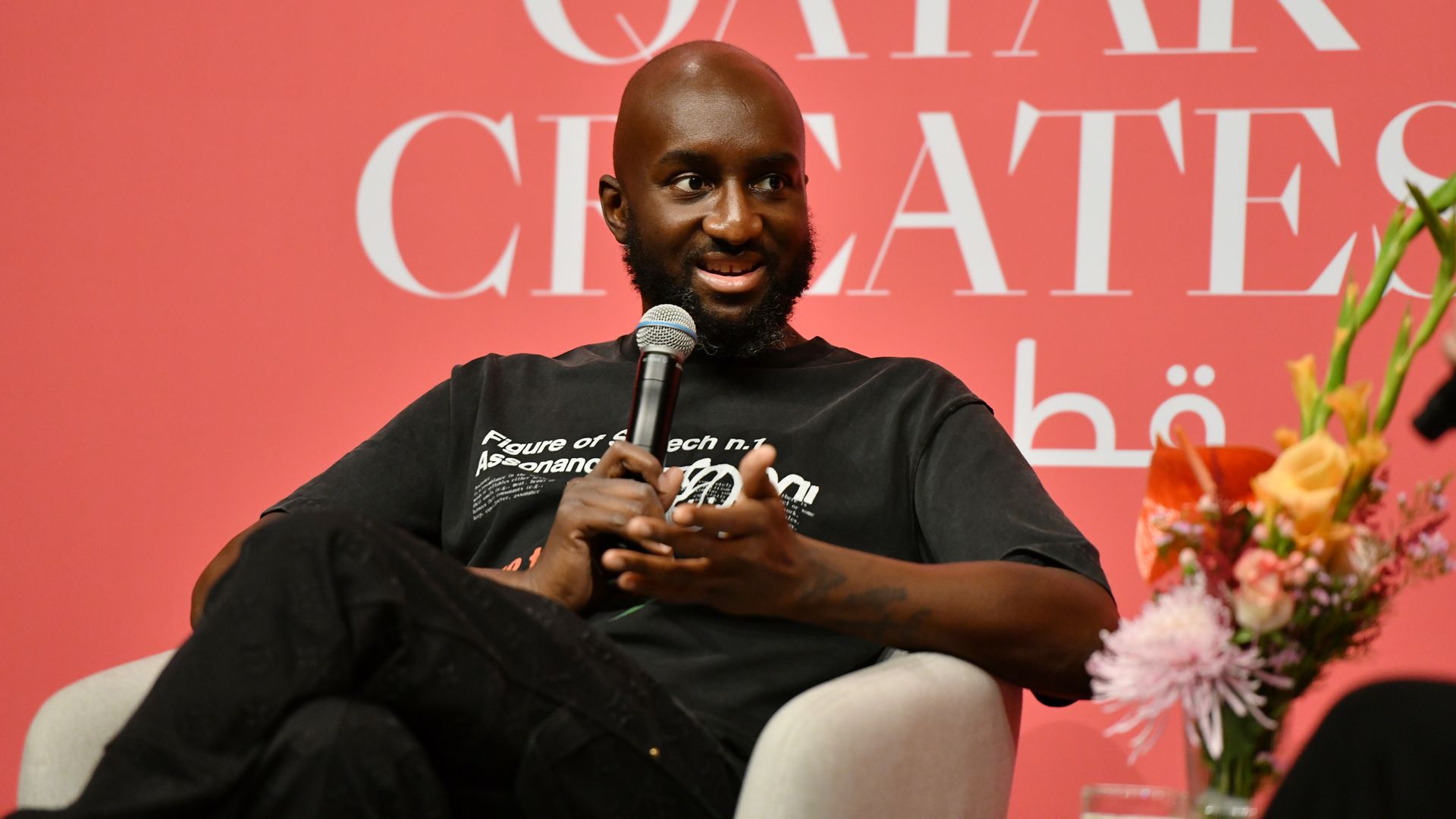 Virgil Abloh speaking on stage in Doha, Qatar
