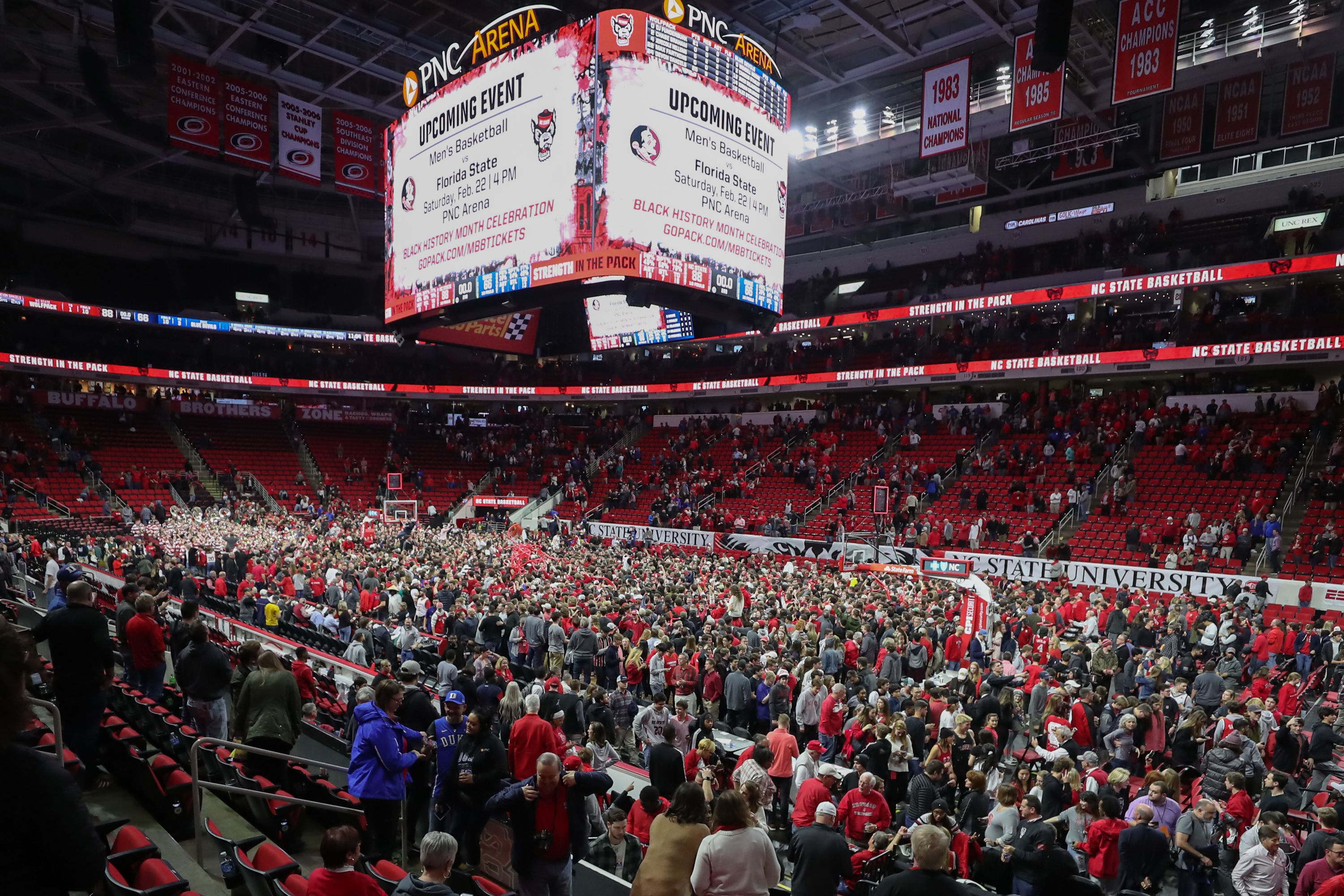 NC State fans storming the court