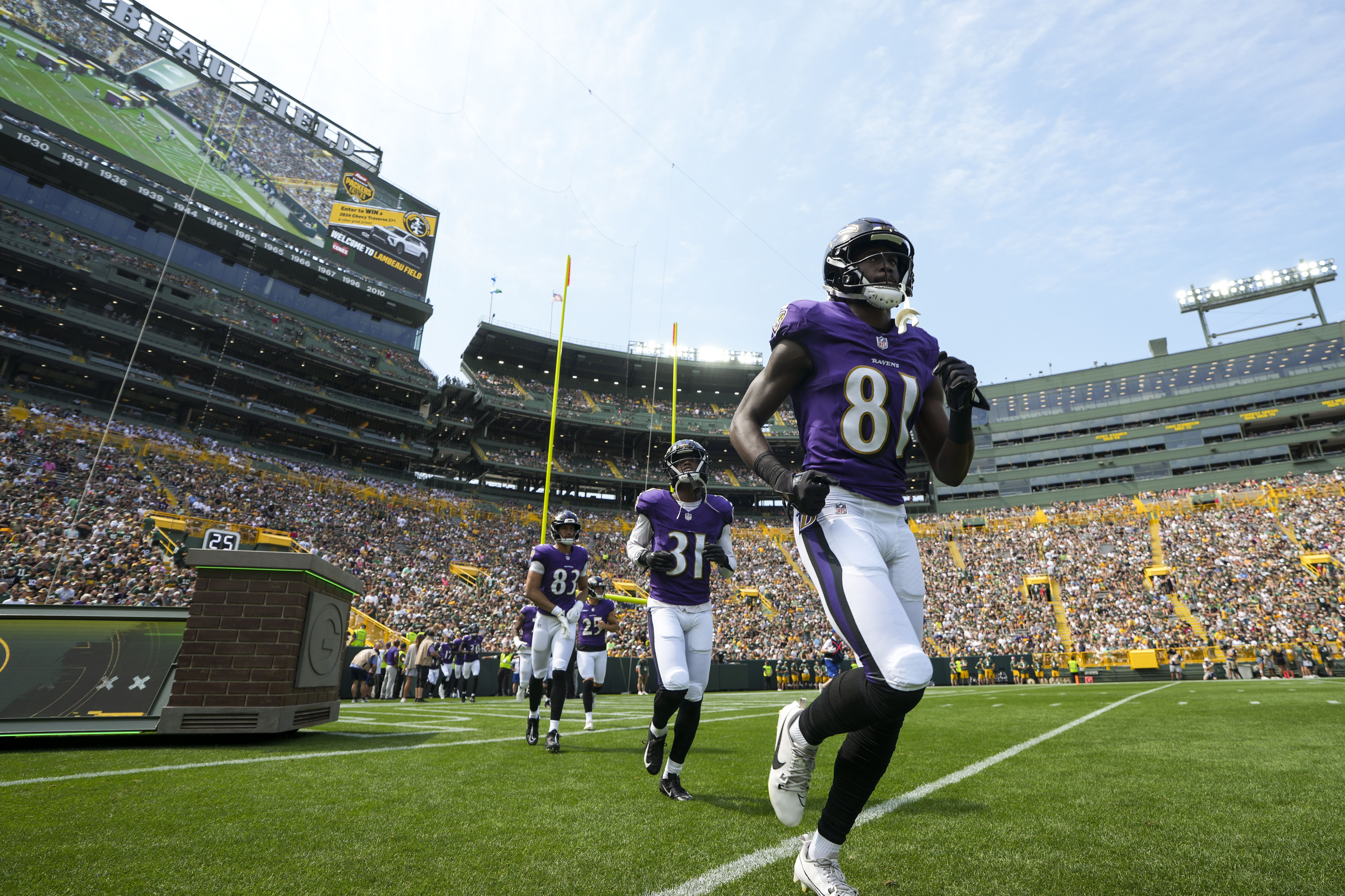 Wide receiver Devontez Walker #81 of the Baltimore Ravens and his teammates enter the field during player introductions prior to an NFL preseason football game against the Green Bay Packers, at Lambeau Field on August 24, 2024 in Green Bay, Wisconsin. (Photo by Todd Rosenberg/Getty Images)