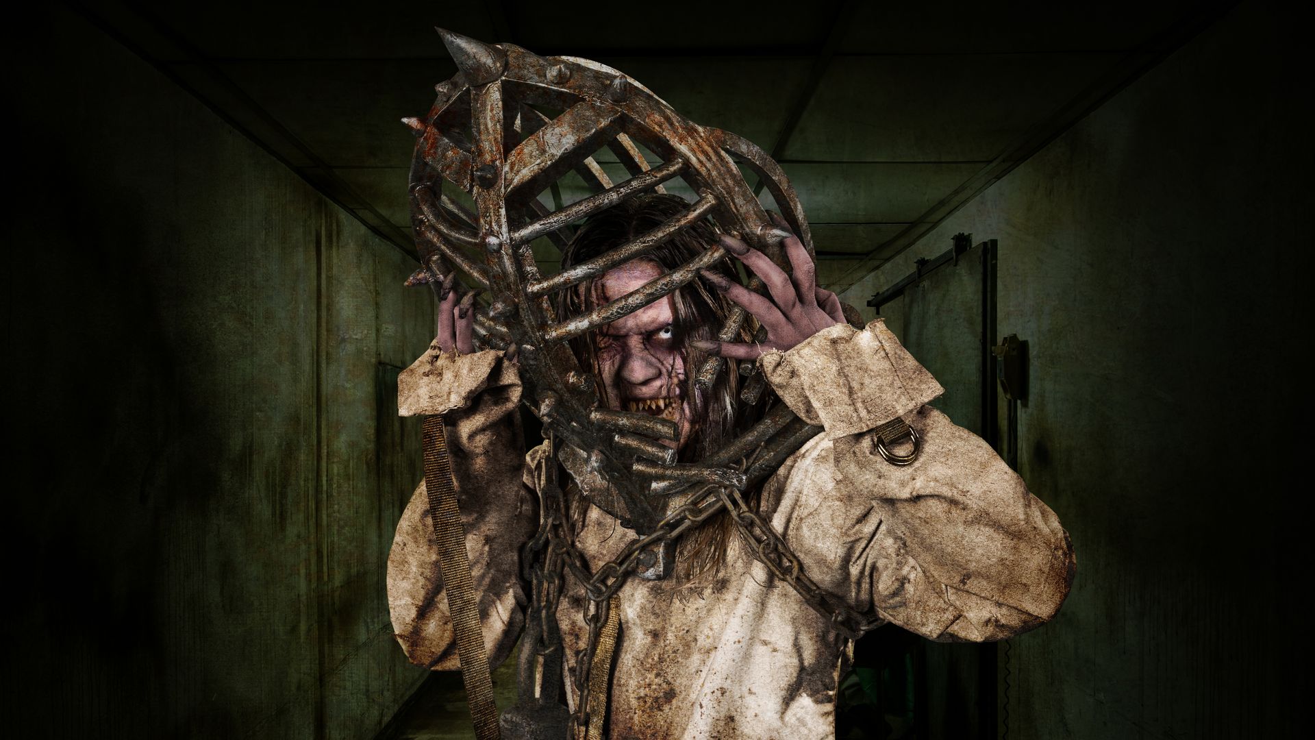 Photo of a scary monster in a cage at a haunted house 