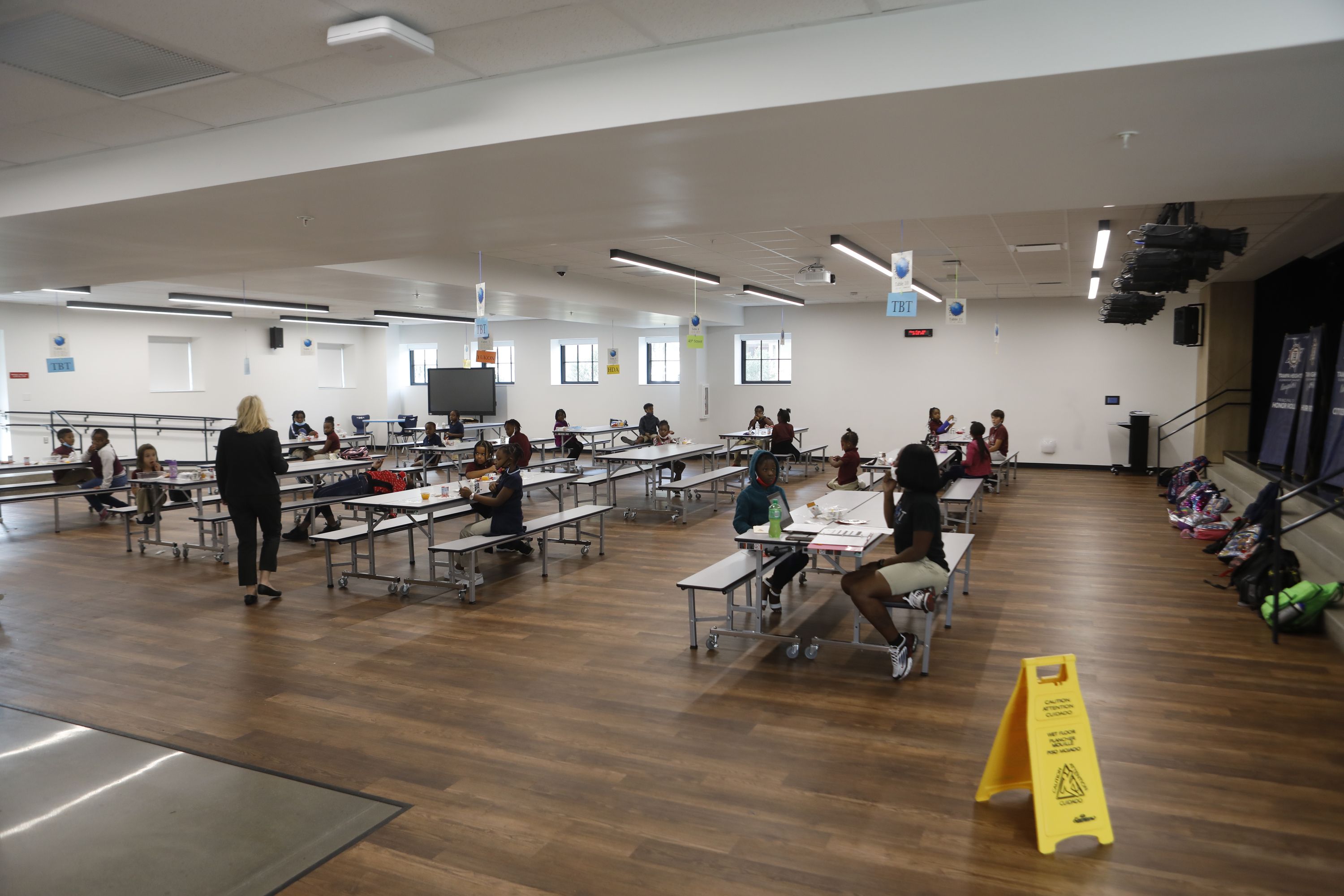 Students eat inside the newly renovated cafeteria at the Tampa Heights Elementary School on Columbus Avenue in Tampa.