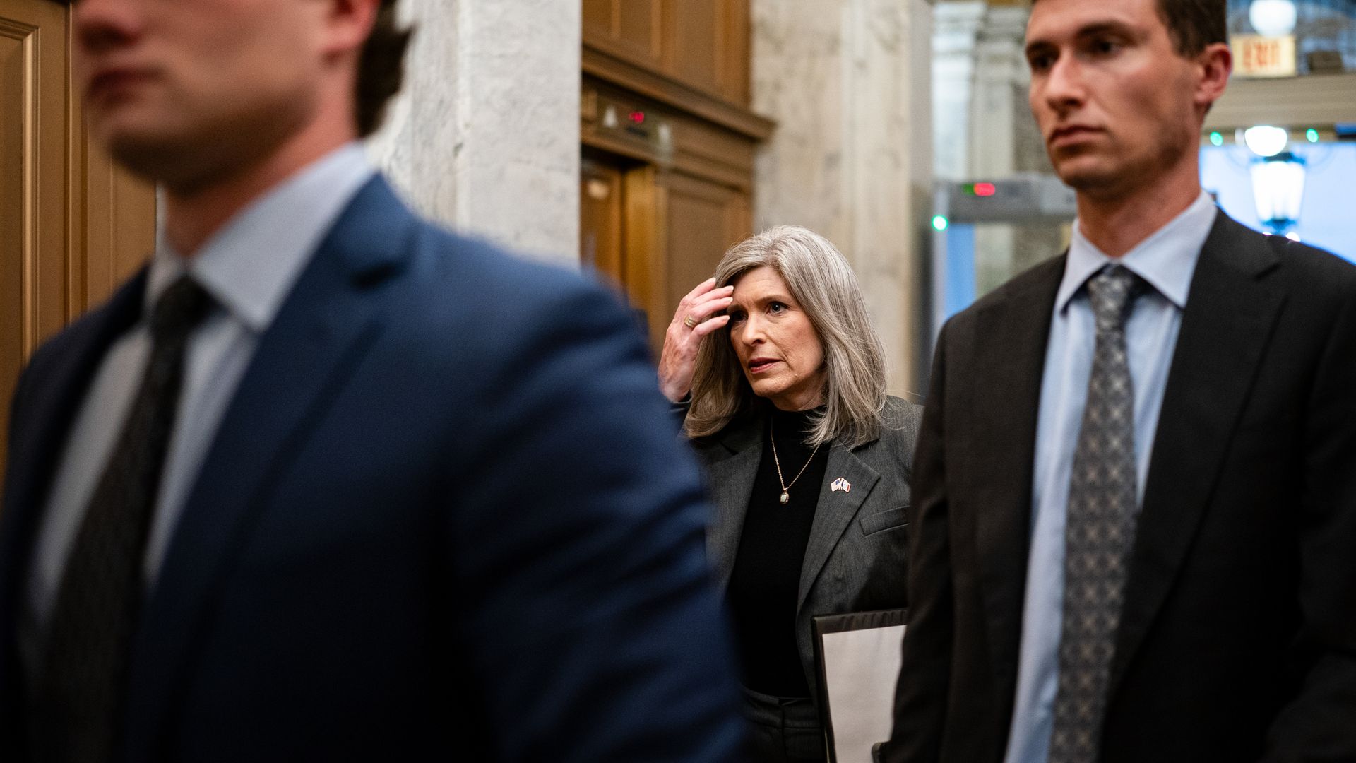 Senator Joni Ernst, a Republican from Iowa, center, arrives for a vote at the US Capitol 