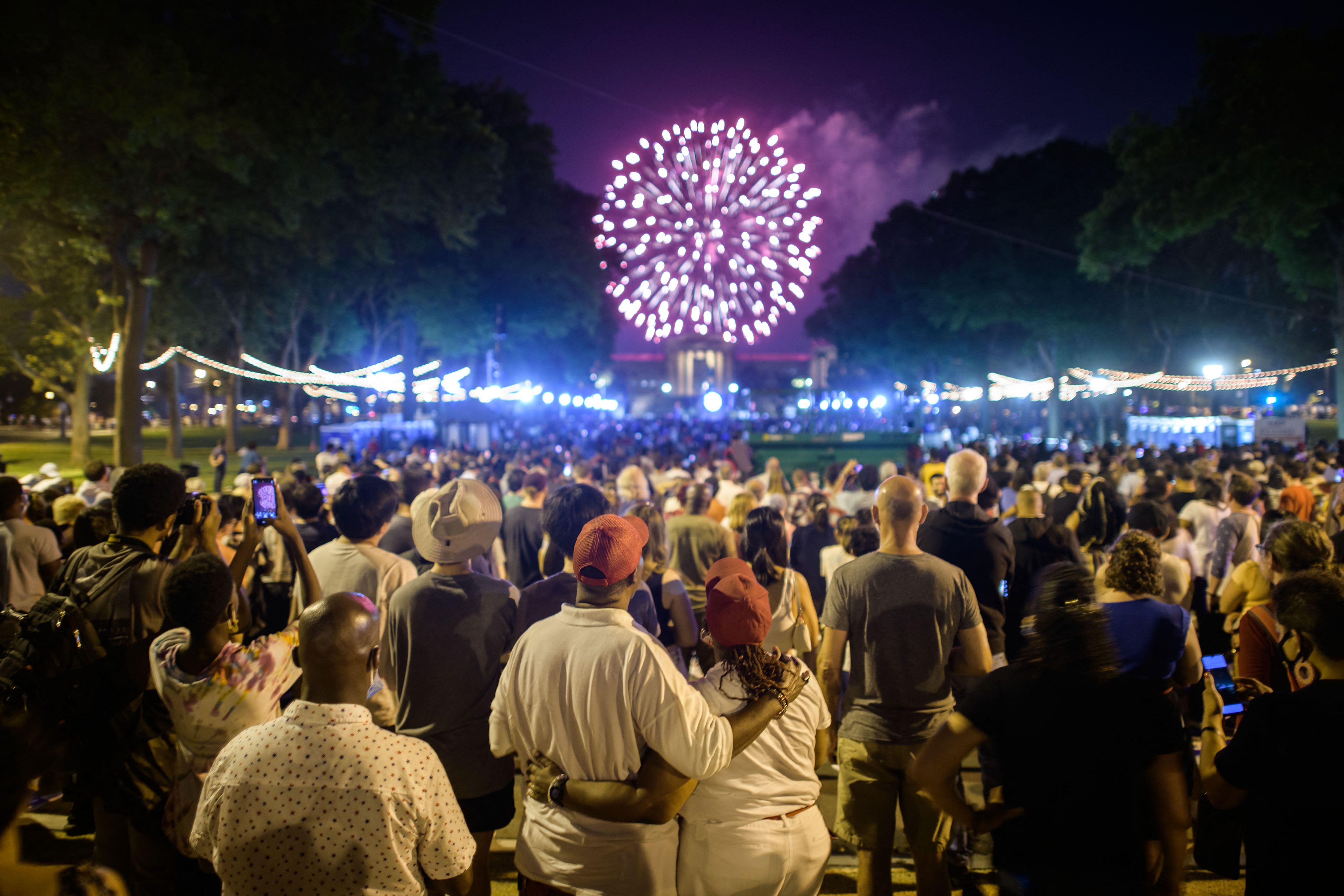  Spectators watch the annual Independence Day fireworks display outside the Philadelphia Museum of Art in Philadelphia on July 4