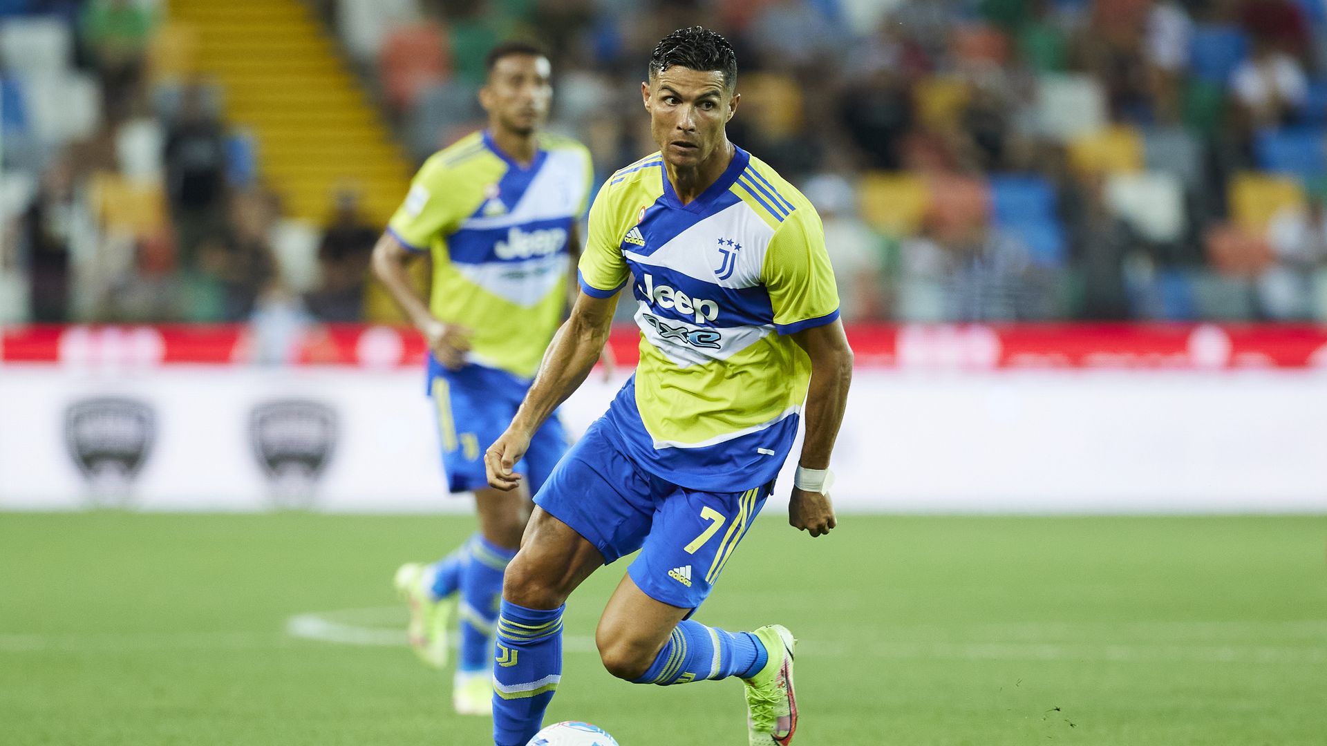Cristiano Ronaldo dribbling the ball in a game with his past club Juventus