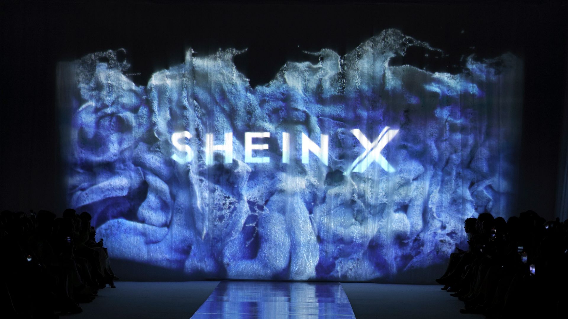 A Shein fashion show backdrop.