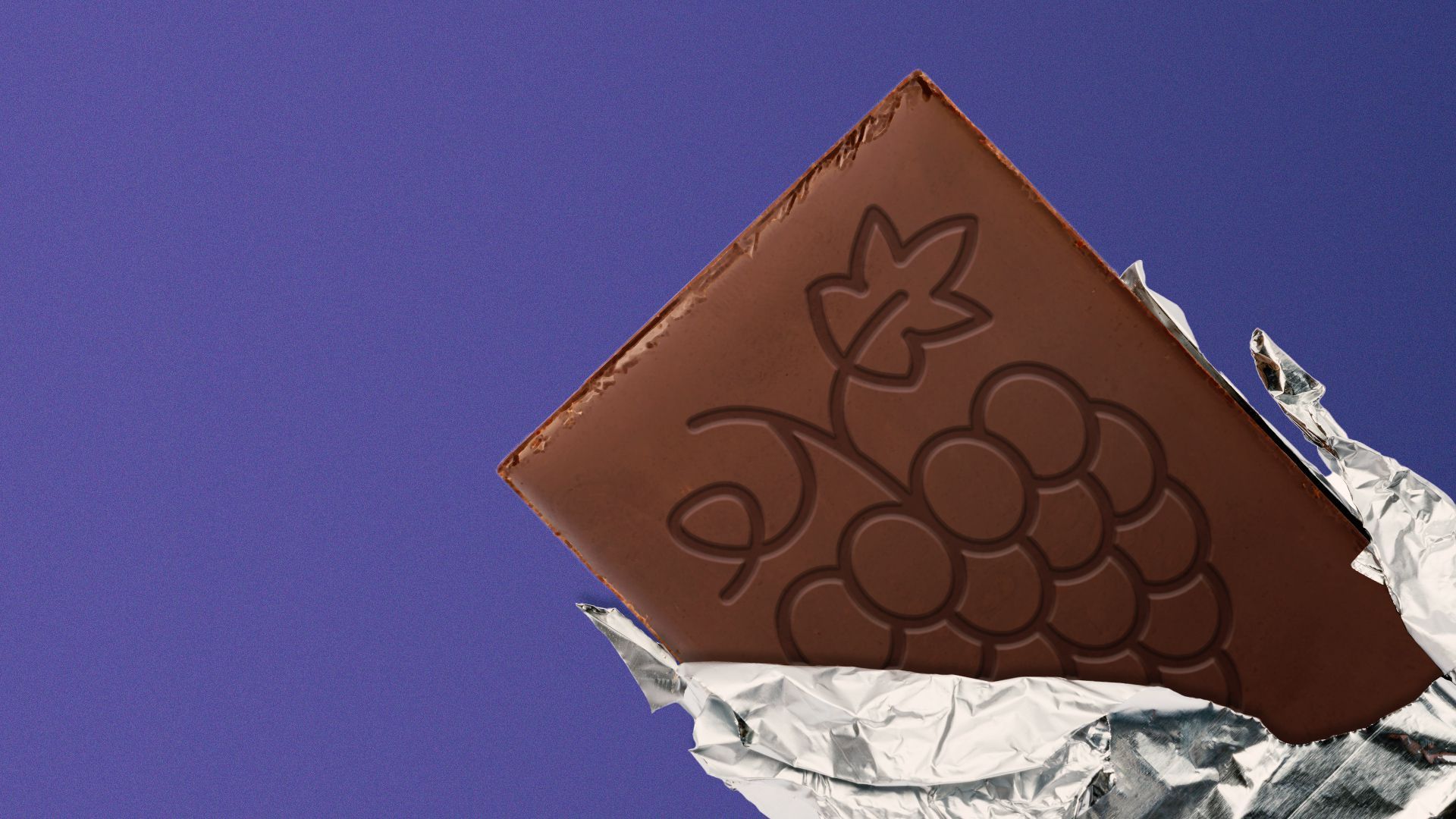 Illustration of a chocolate bar with an image of grapes stamped on it.