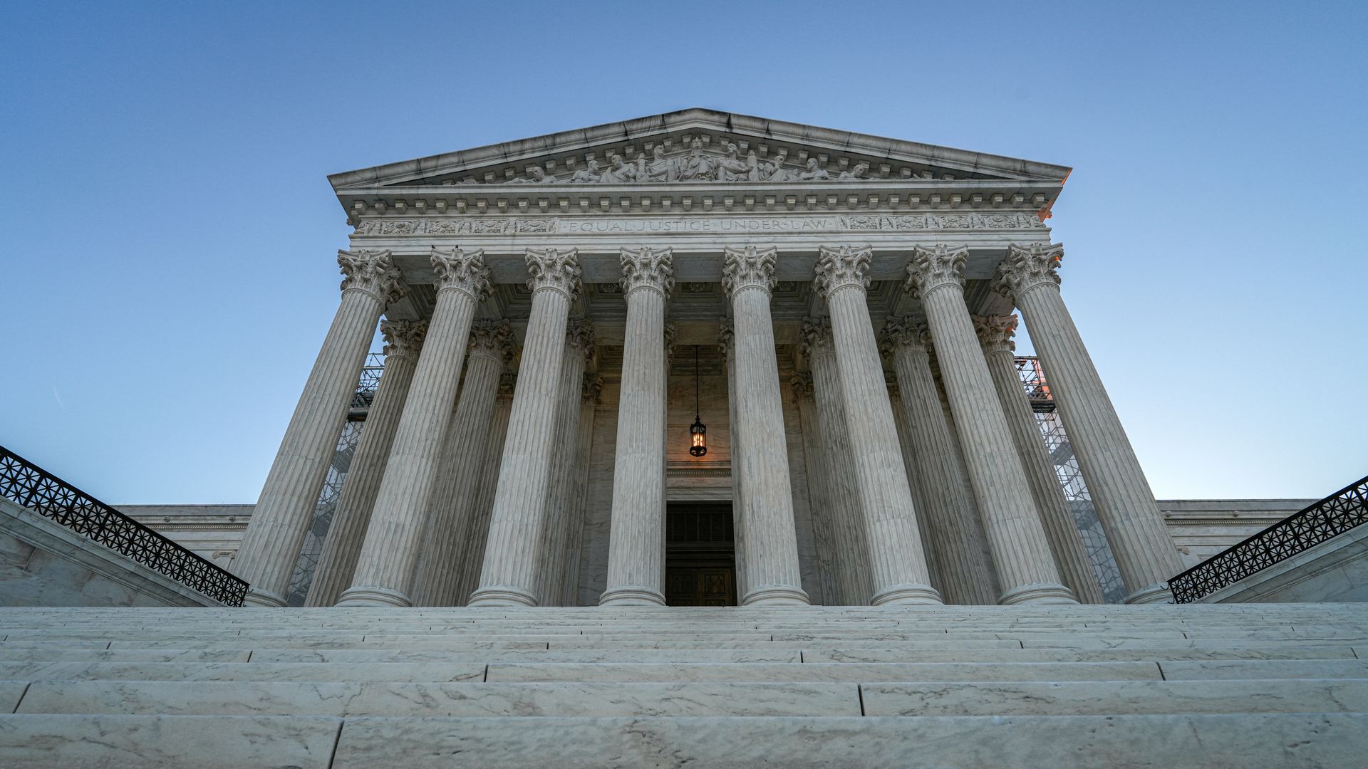 The U.S. Supreme Court is pictured from a low angle