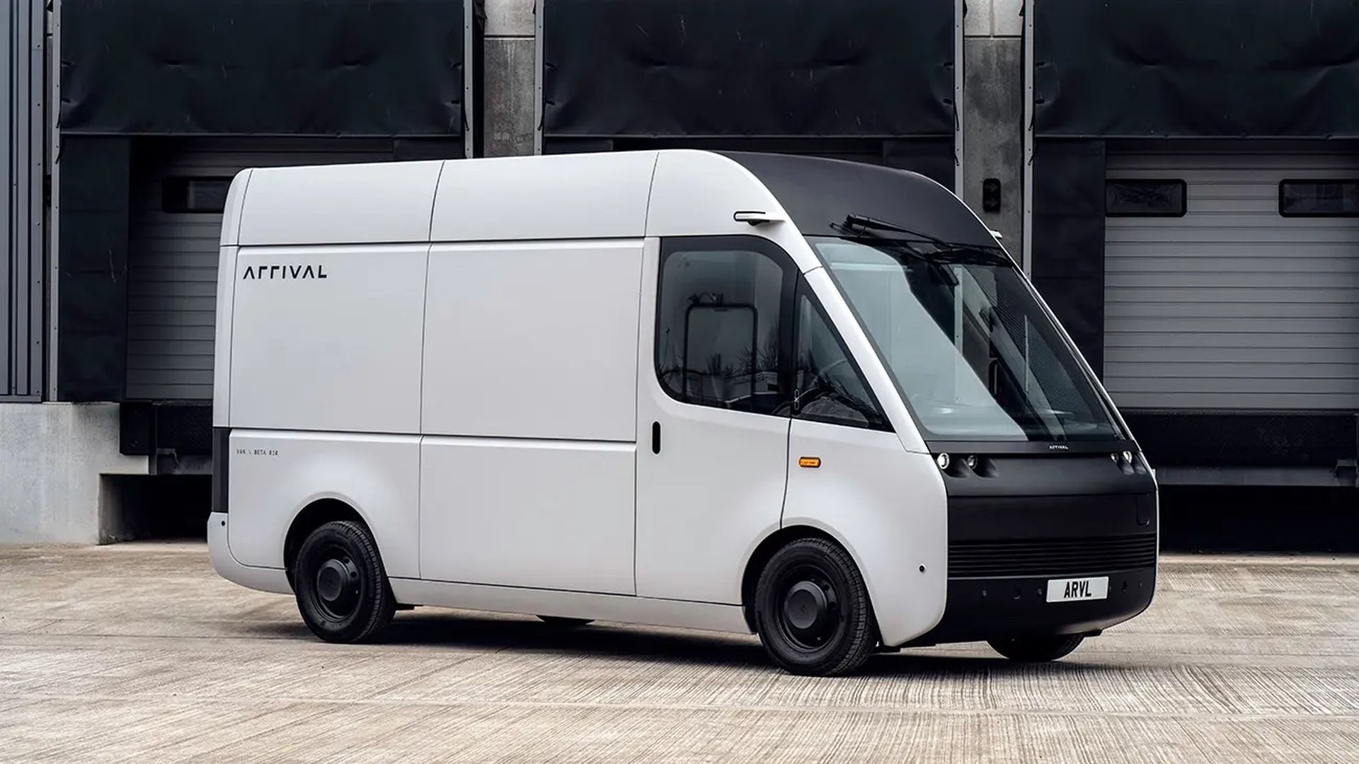 Small white van that says "arrival" on the side