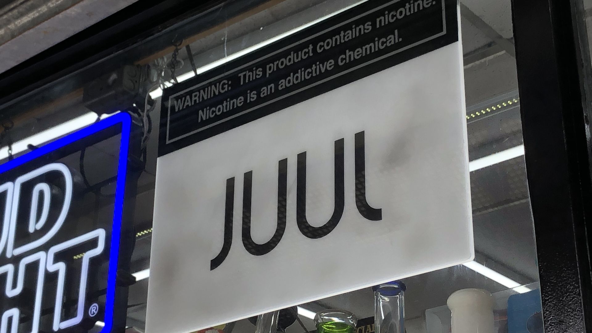 Juul Vape sign in convenience store window, Queens, New York. 