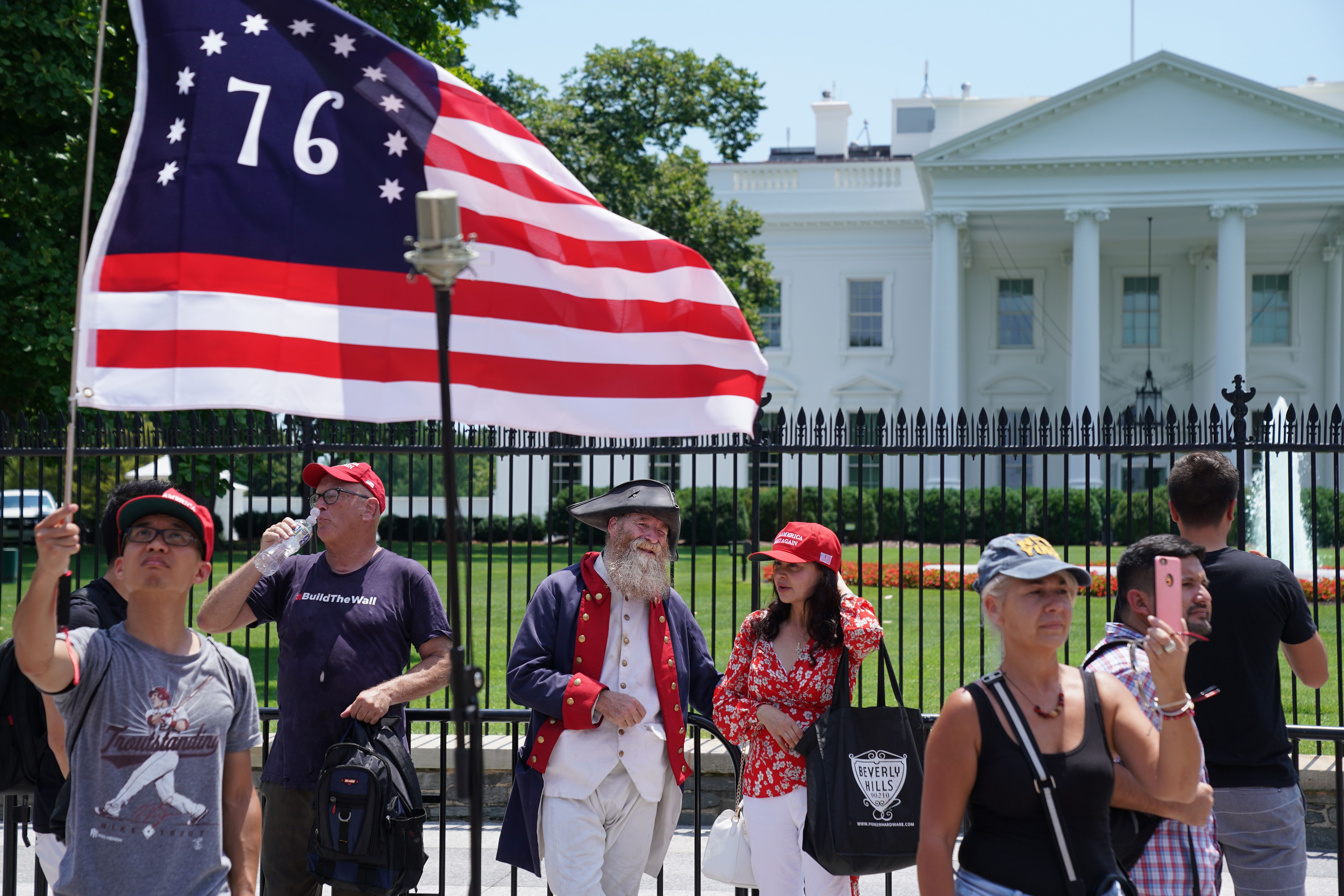 Supporters of U.S. President Donald Trump rally on Pennsylvania Avenue on the north side of the White House July 03, 2019 in Washington, DC.