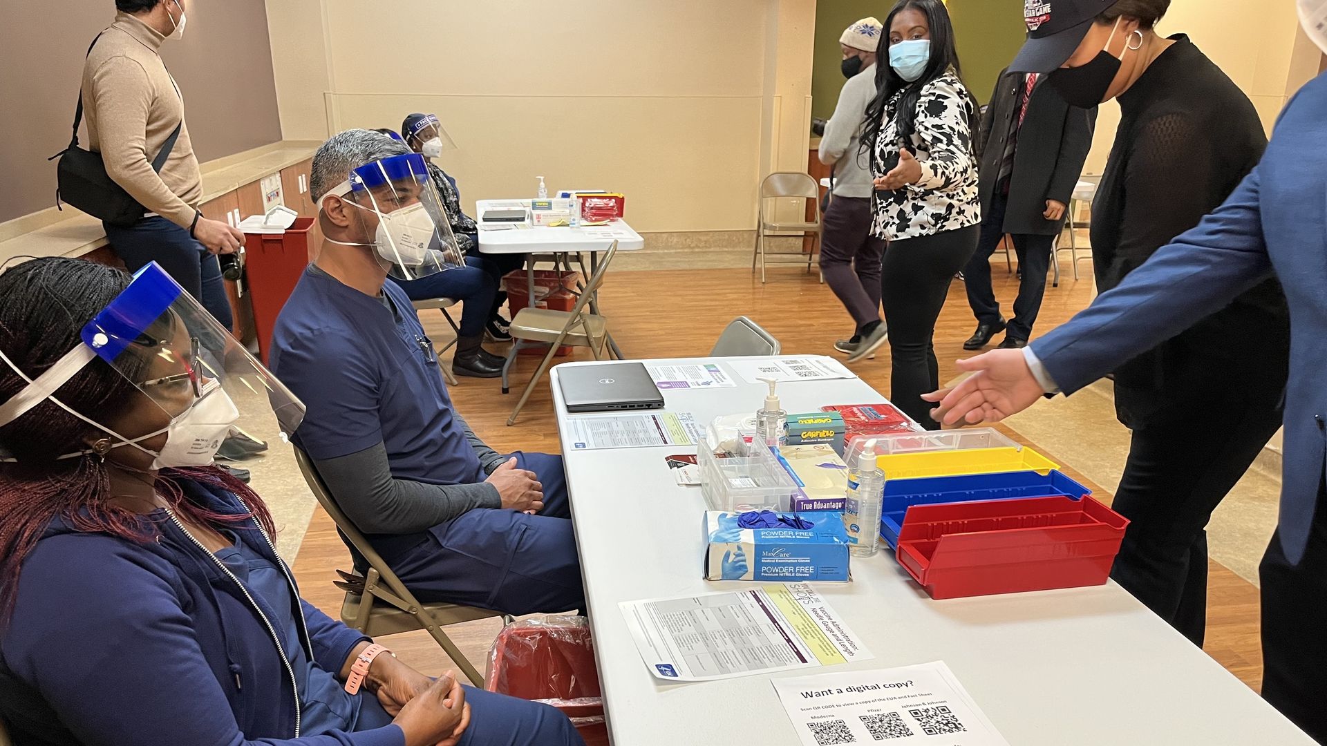 Employees at a D.C. COVID-19 center provide guidance on vaccinations and testing.
