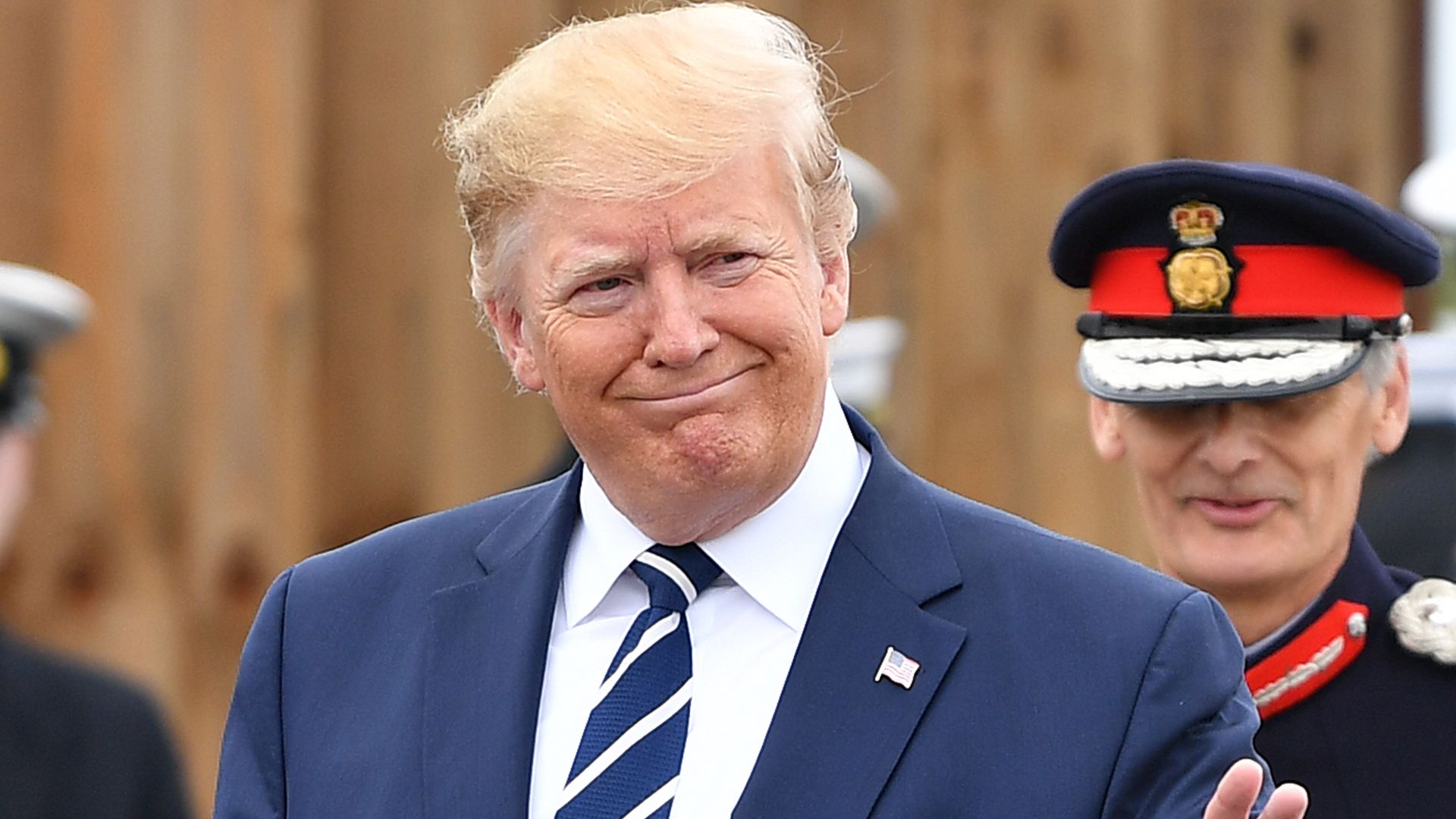 President Trump waiving.