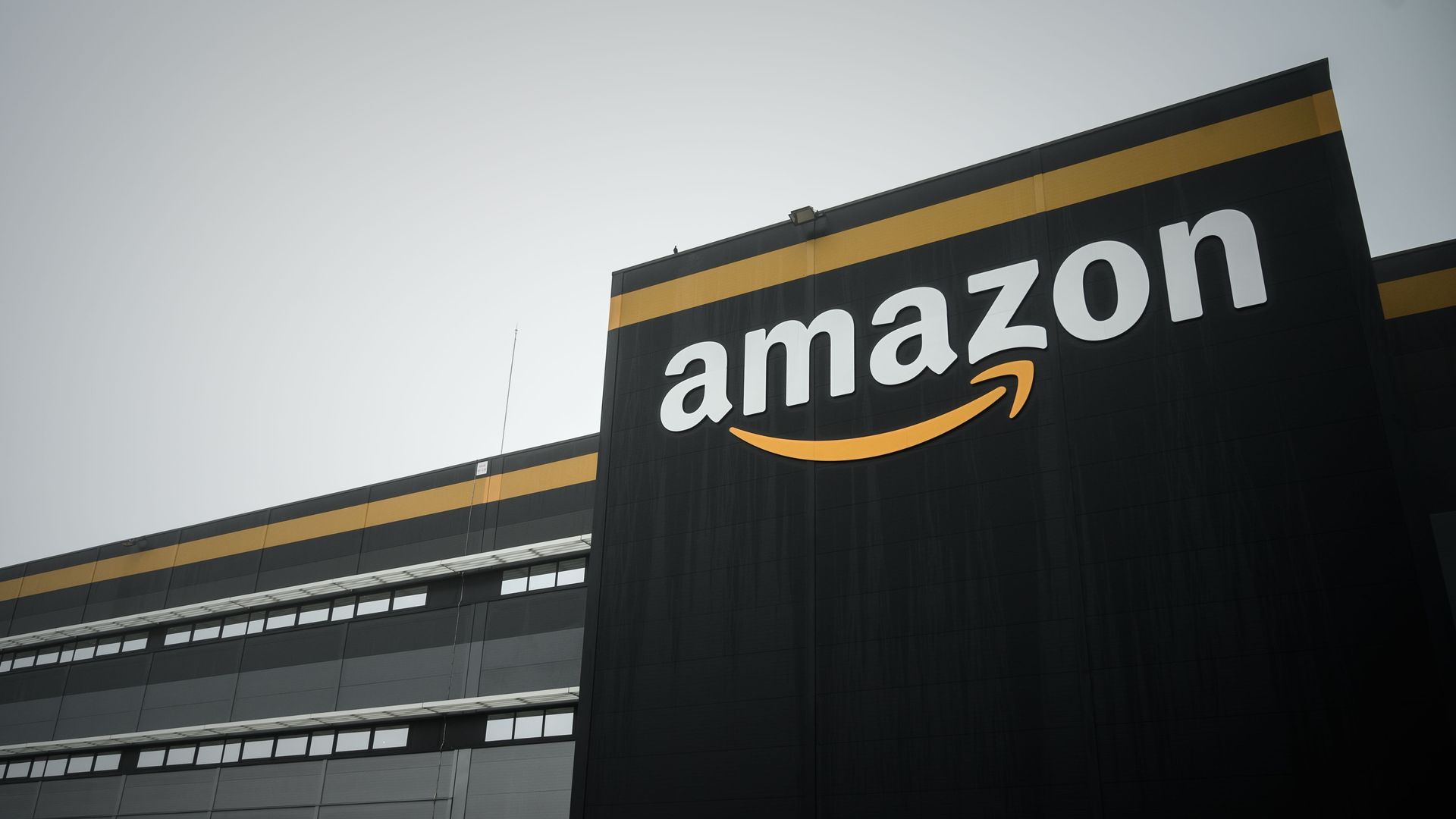 A photo of a building with Amazon's name and logo on it