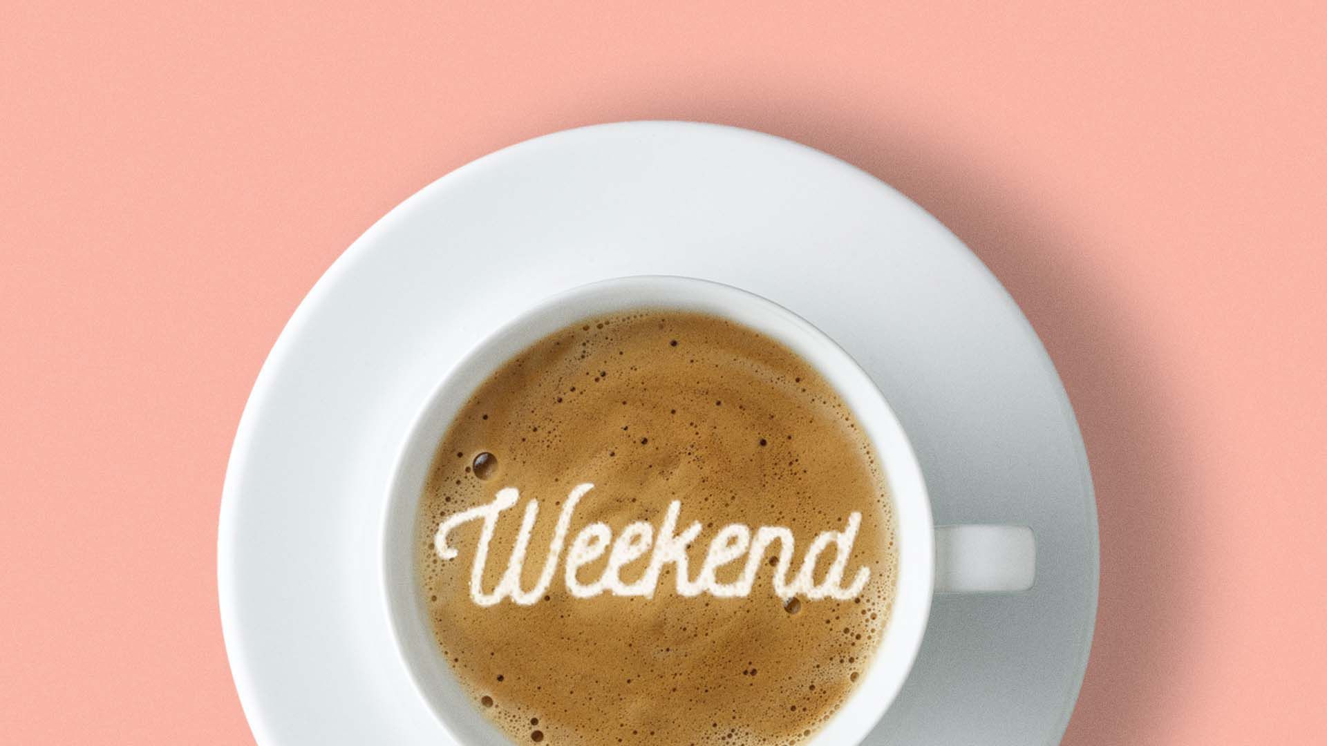 A latte with "weekend" written in the foam.