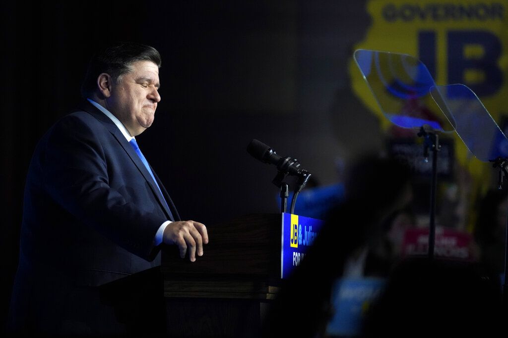 Photo of a man at the podium.