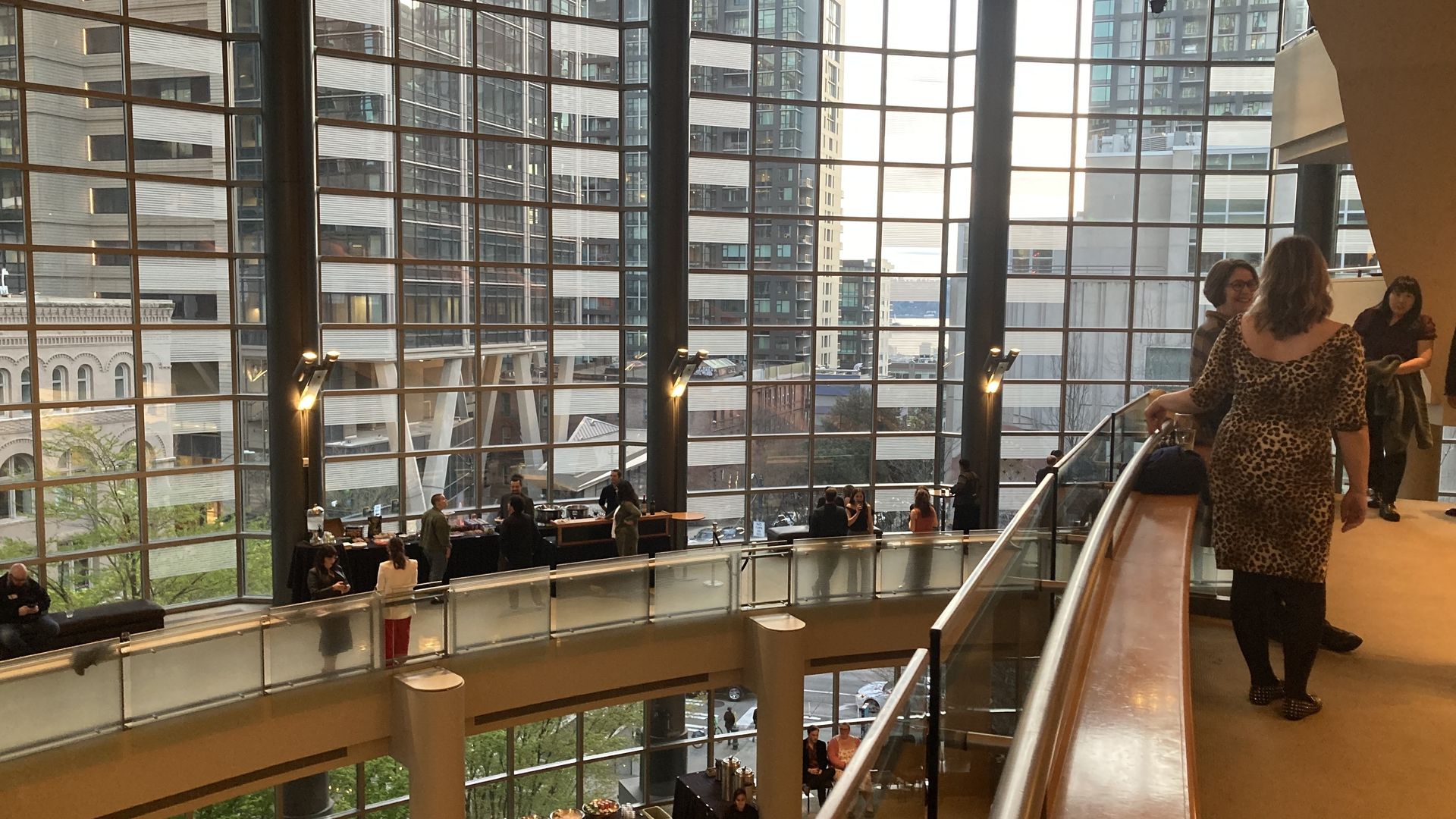 An insider's view of the lobbies and glass windows of Benaroya Hall in Seattle. 