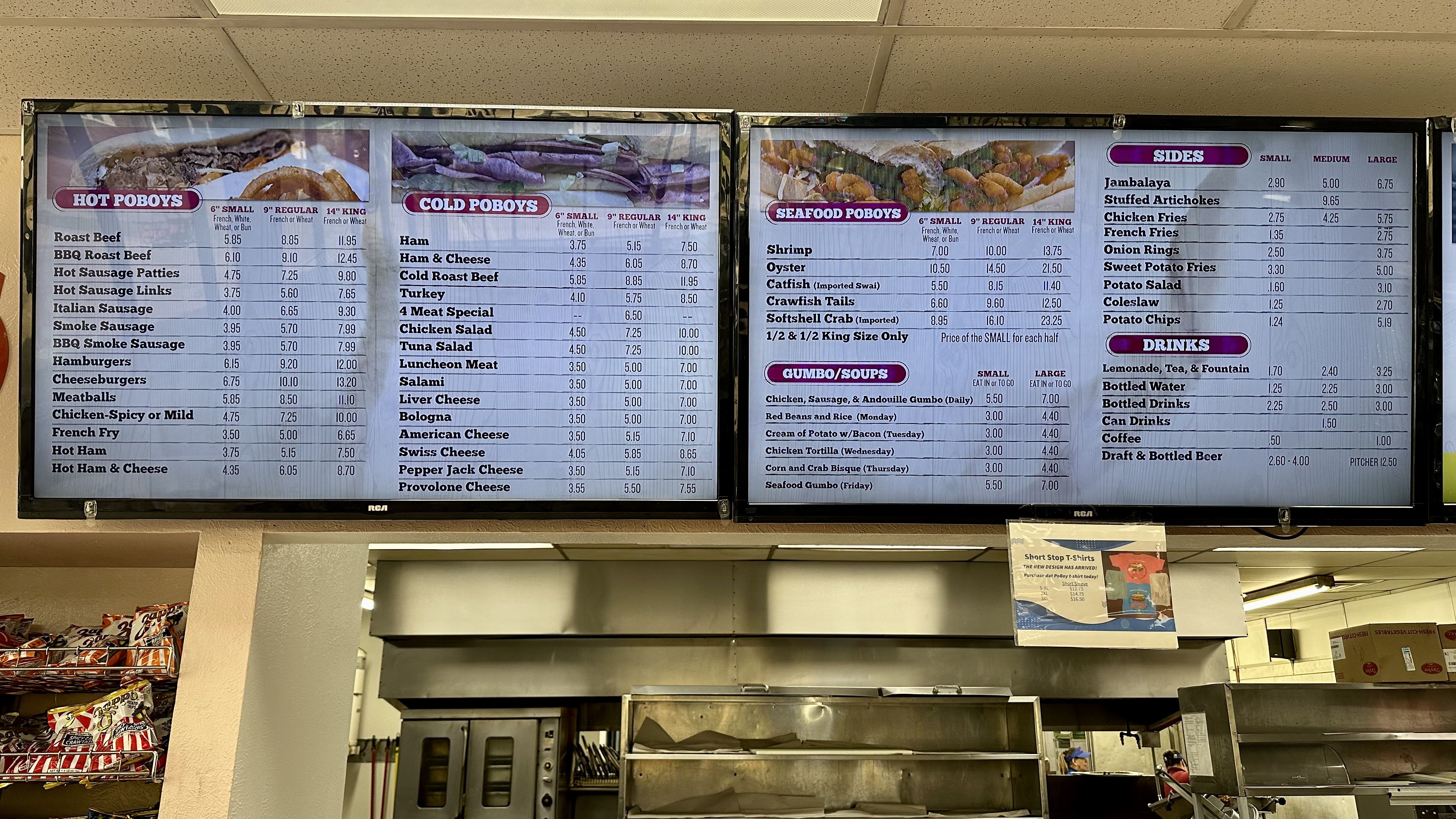Photo shows the menu board with all the poboys at Short Stop.
