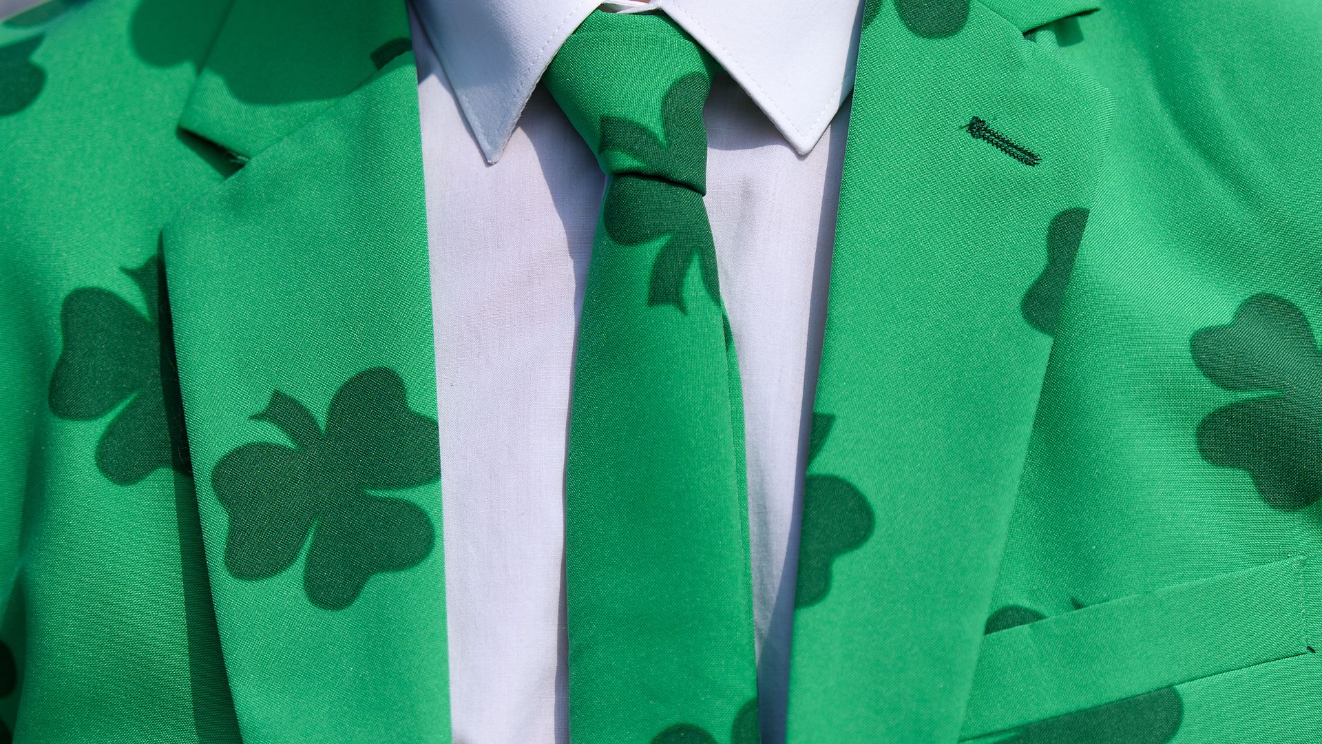 A shamrock-printed green suit and tie