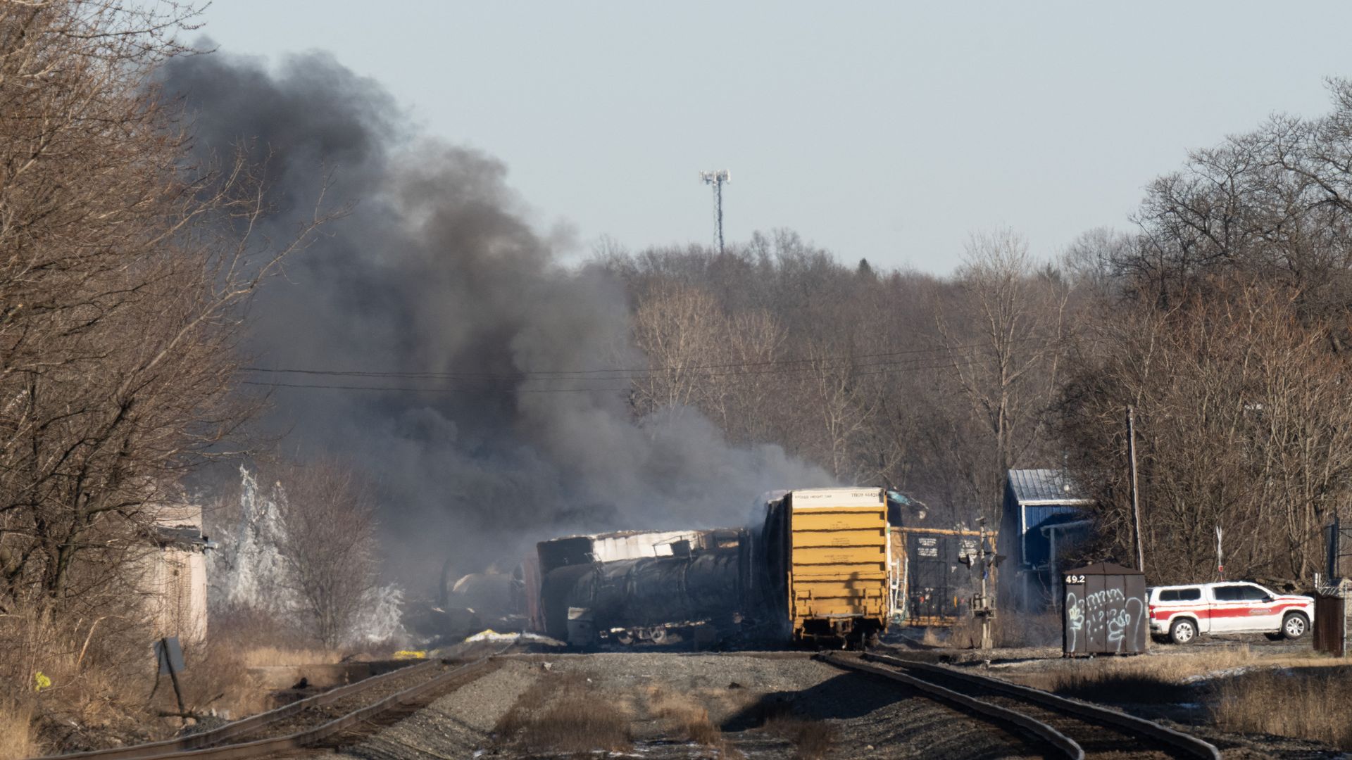 Smoke rises from a derailed cargo train in East Palestine, Ohio, on February 4
