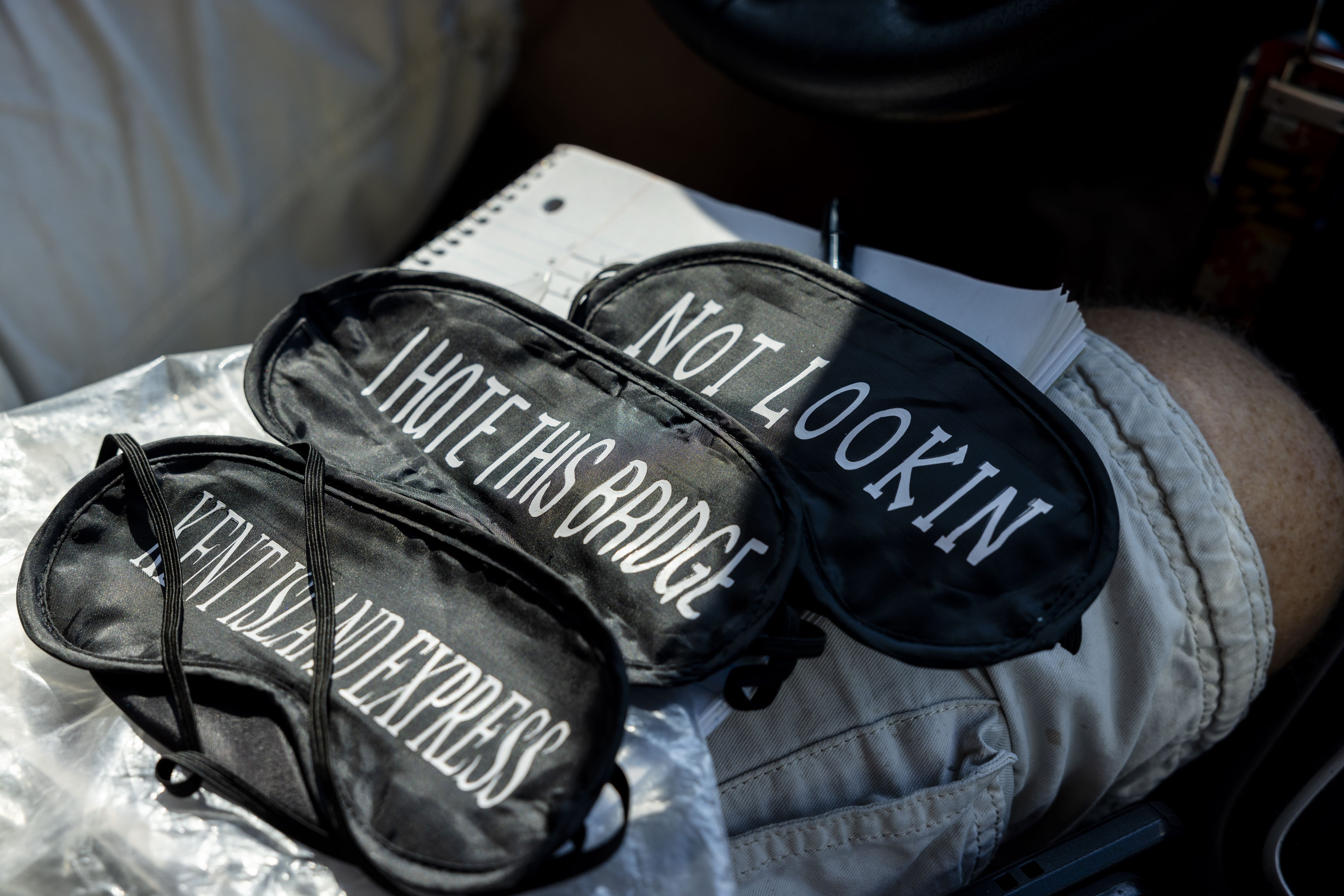 Eye masks that say "Not looking" and "I hate this bridge"