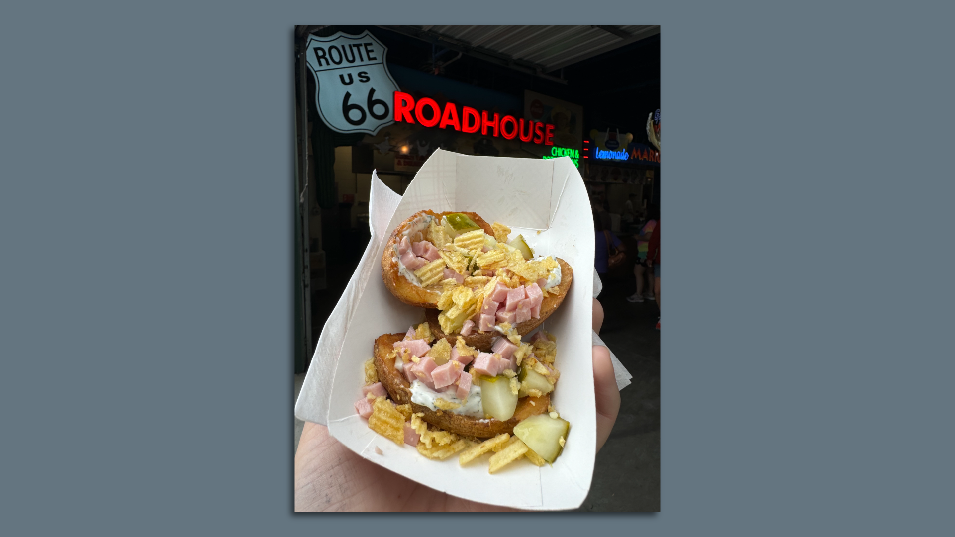 A deconstructed ham roll on a potato skin