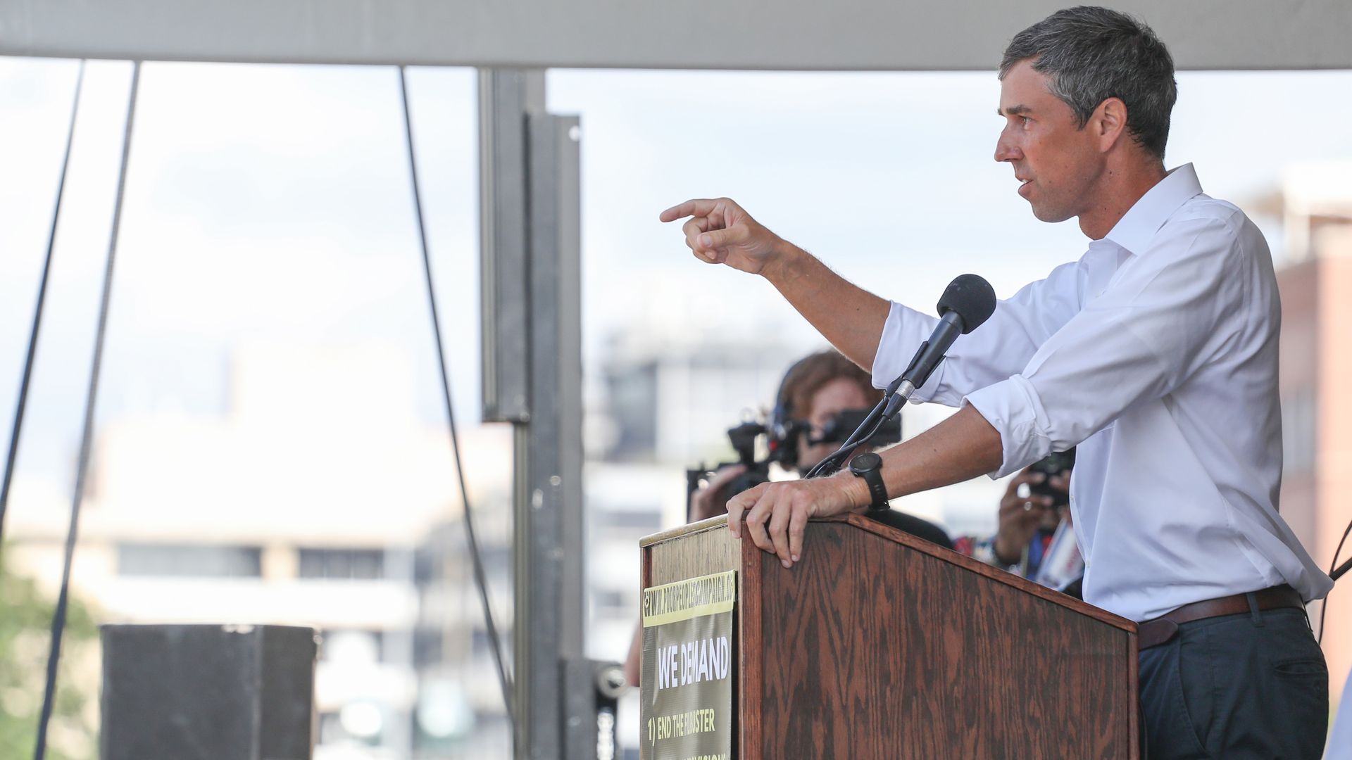 Beto O'Rourke speaking from a lectern.