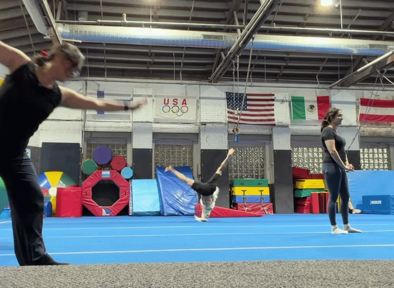 Woman does one-handed cartwheel
