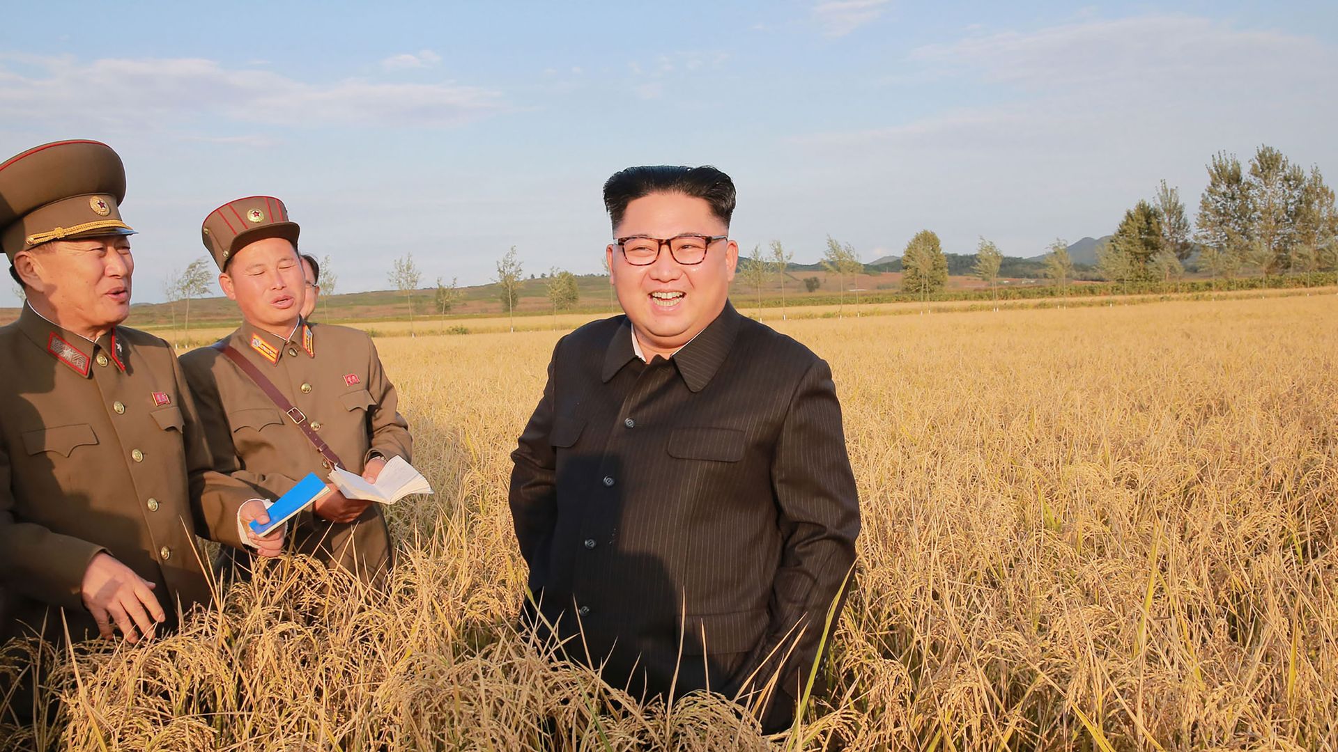 North Korean leader Kim Jong-Un (C) visiting Farm No. 1116 under Korean People's Army (KPA) Unit 810 at an undisclosed location