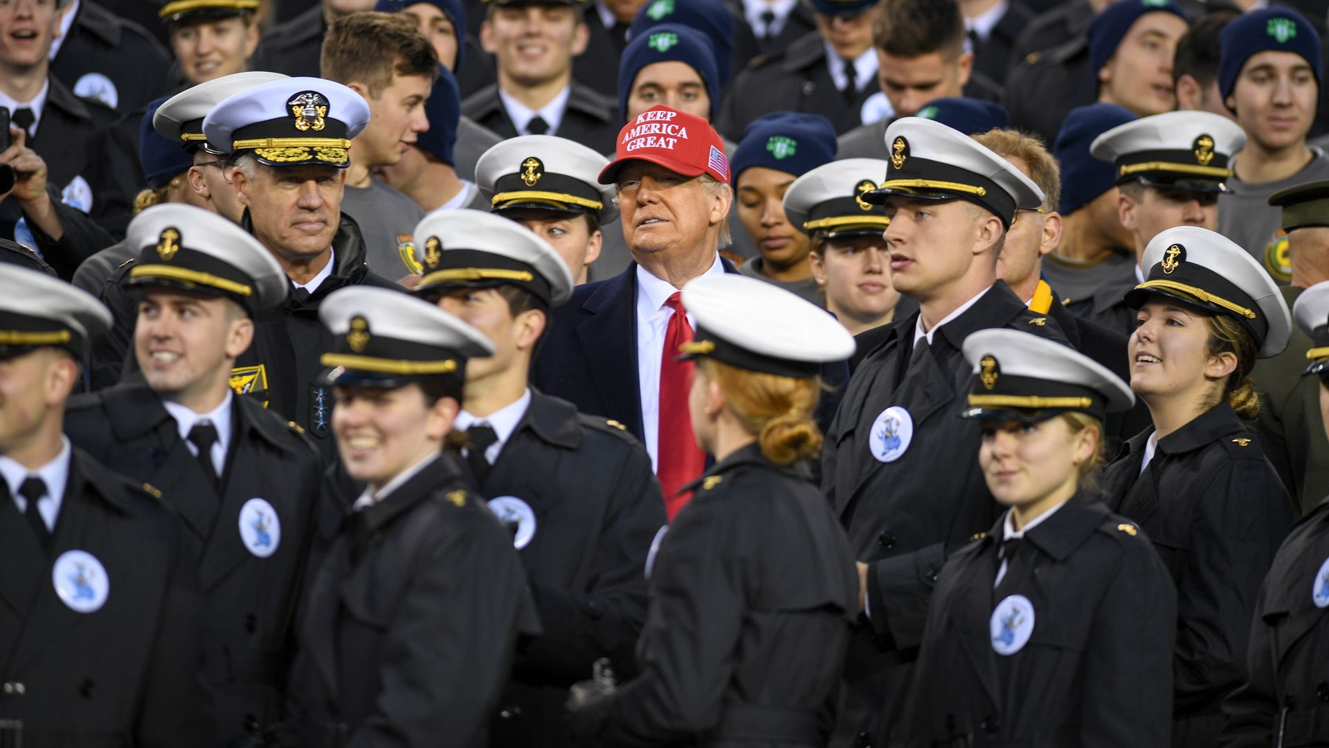 Donald Trump, amid a crowd of U.S. Naval Academy cadets.