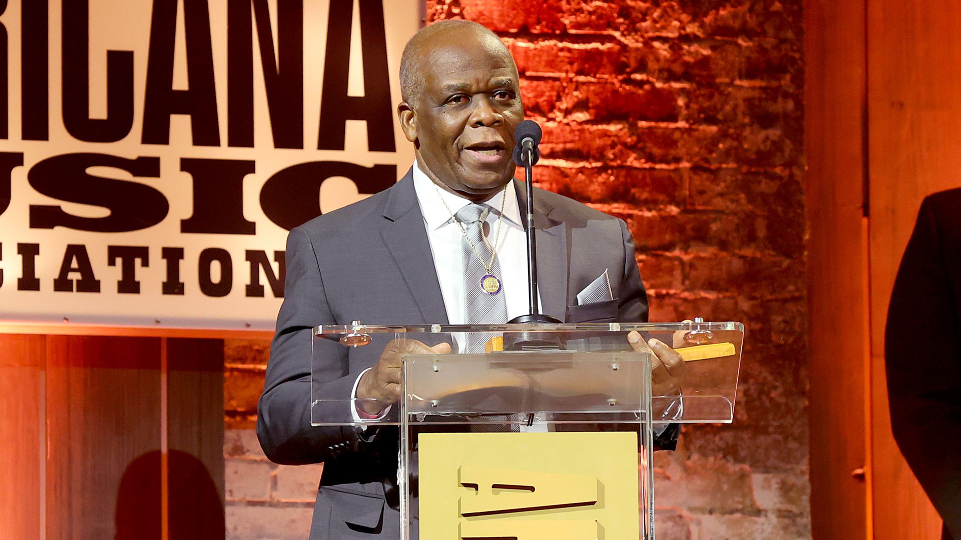 Paul Kwami accepting an award.