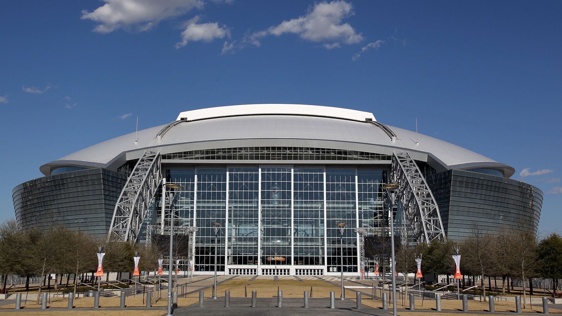 A football stadium in front of sunny skies