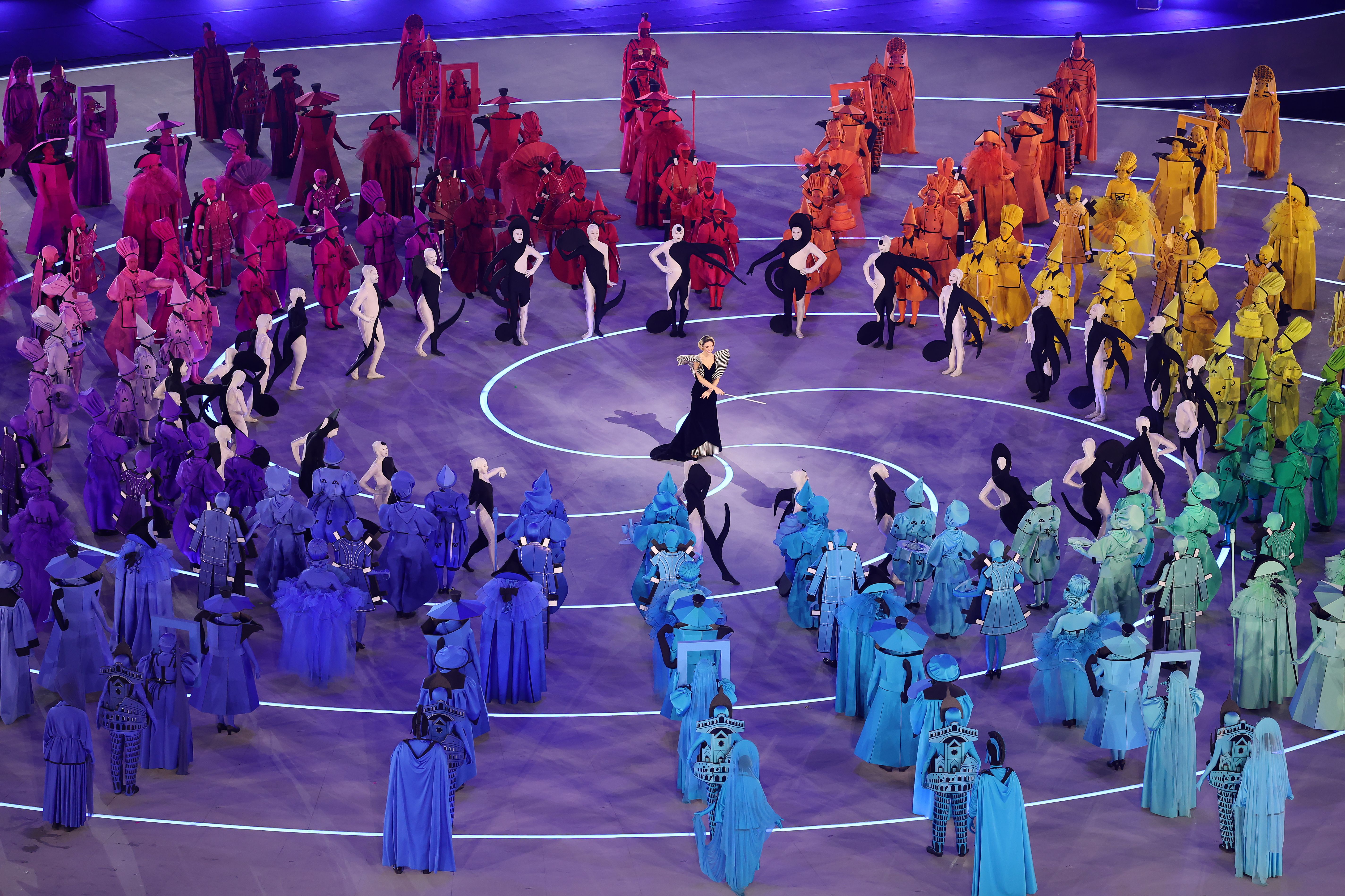 Italian actor Matilda De Angelis singing on stage at the 2026 Winter Olympics opening ceremony at San Siro Stadium in Milan, Italy.