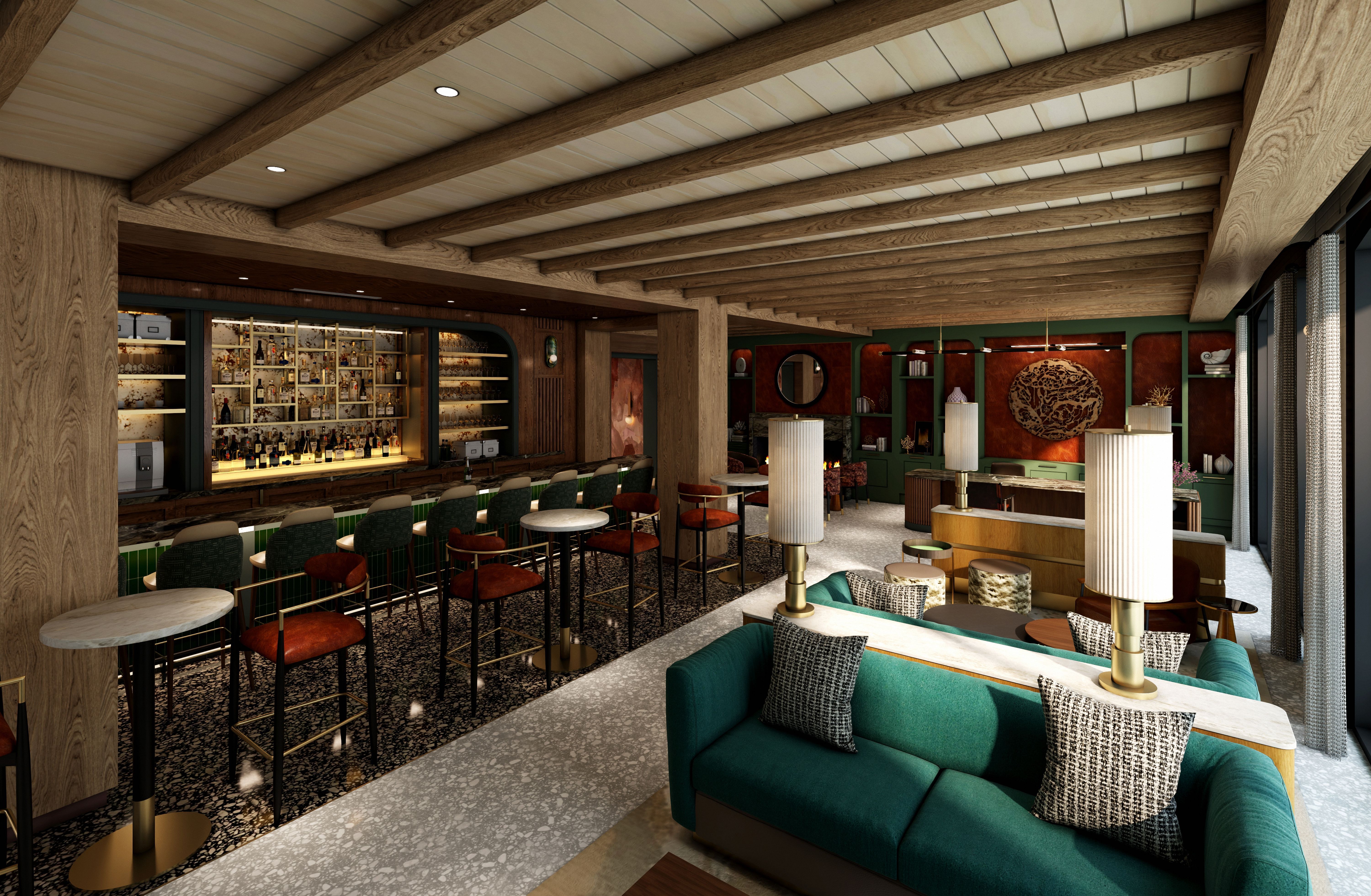 Canal House bar room with green couches 