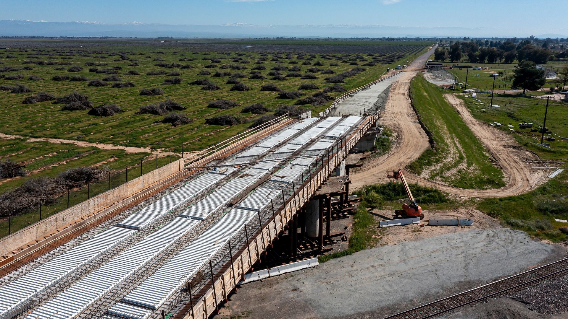 A cherry picker during the construction of a high-speed rail project in Madera County, California, US, on Monday, March 24, 2025. The Trump administration has launched a review of California's high-speed rail project, adding to long-standing doubts about whether the venture, plagued by cost overruns
