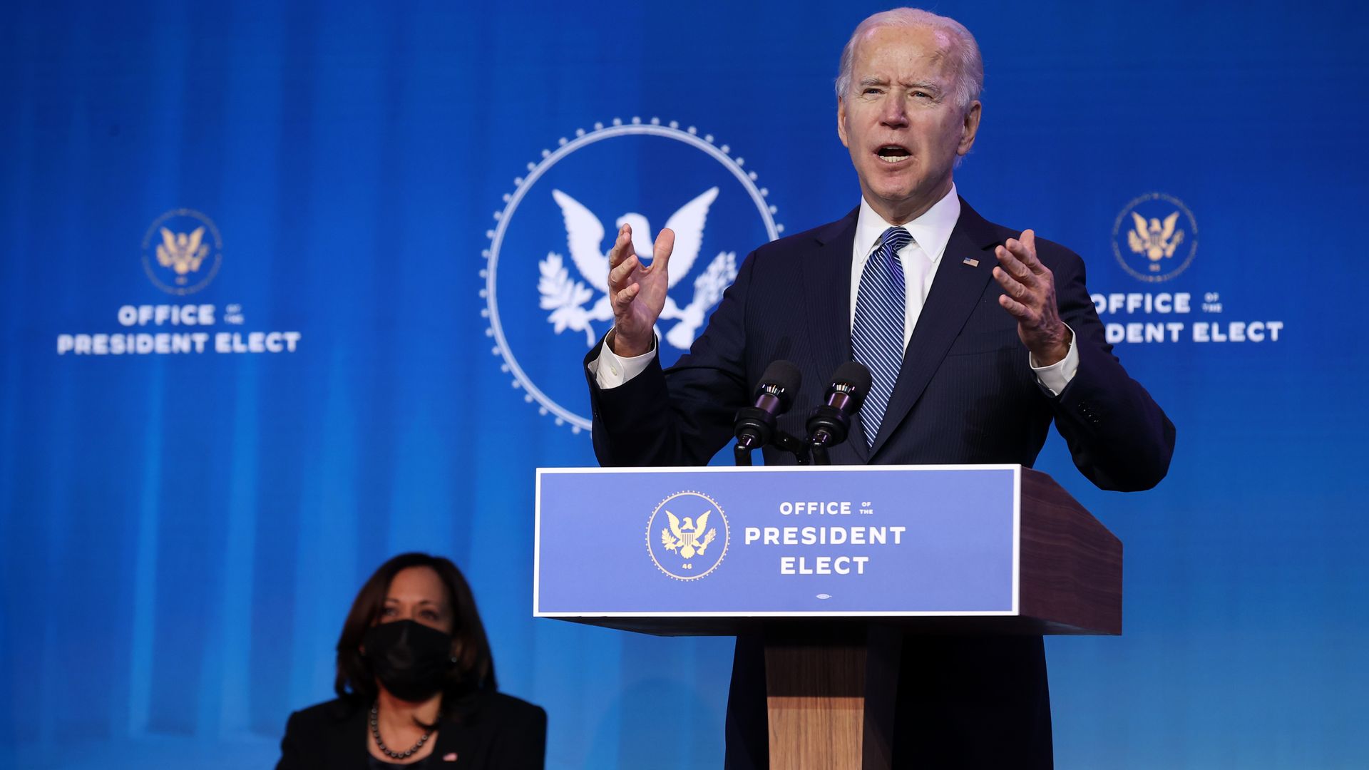 Joe Biden delivers remarks as Kamala Harris looks on before announcing his choices for attorney general and other leaders of the Justice Department at The Queen theater January 07