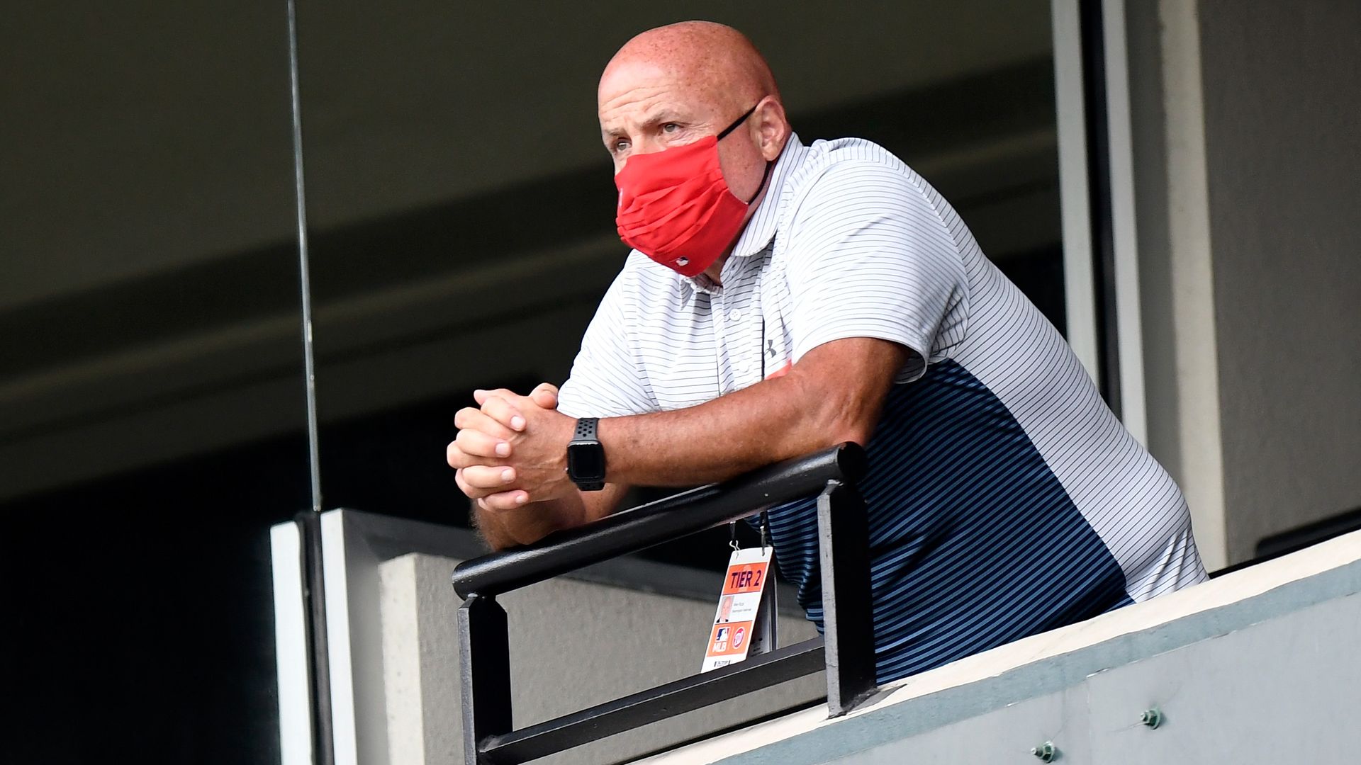 General manager Mike Rizzo of the Washington Nationals watches the game in the sixth inning against the Baltimore Orioles at Oriole Park at Camden Yards on August 14, 2020 in Baltimore, Maryland. 