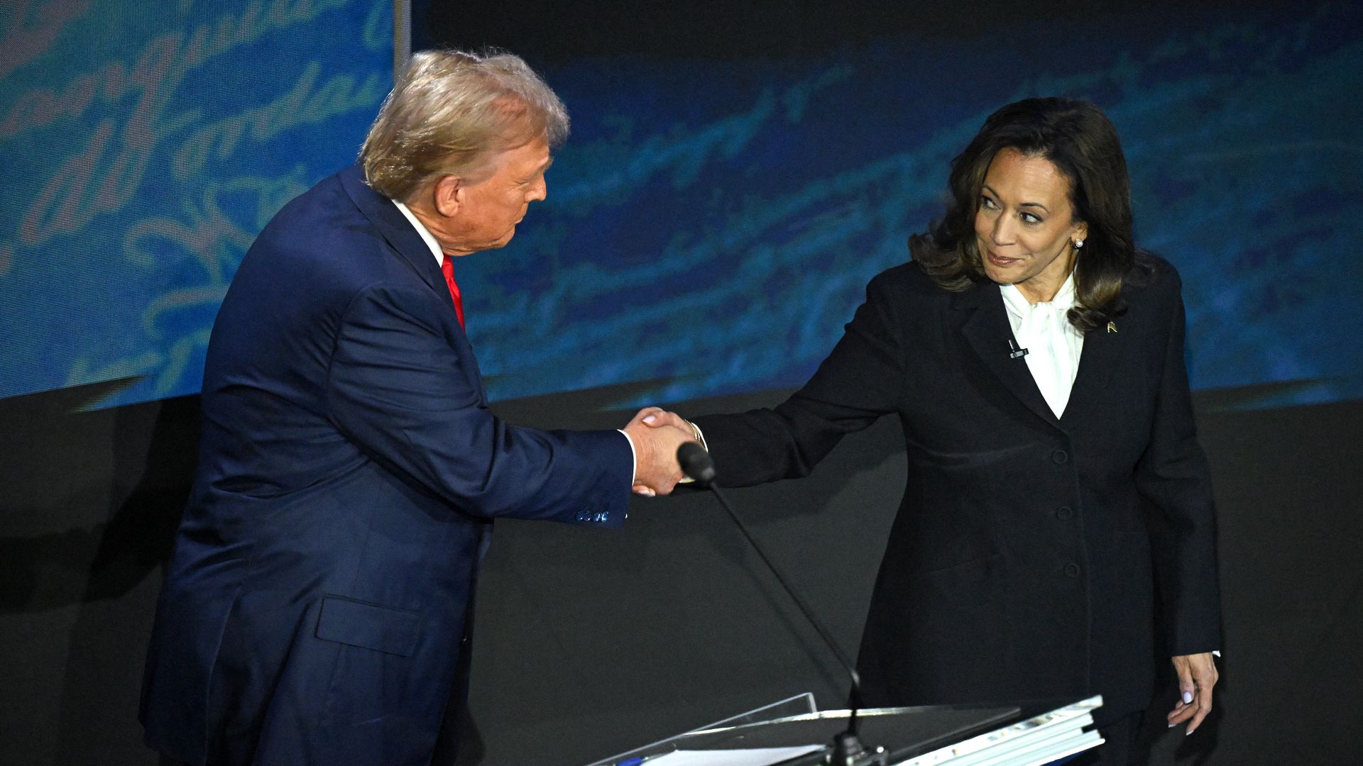  Vice President Kamala Harris shakes hands with former President Trump during September's presidential debate. 