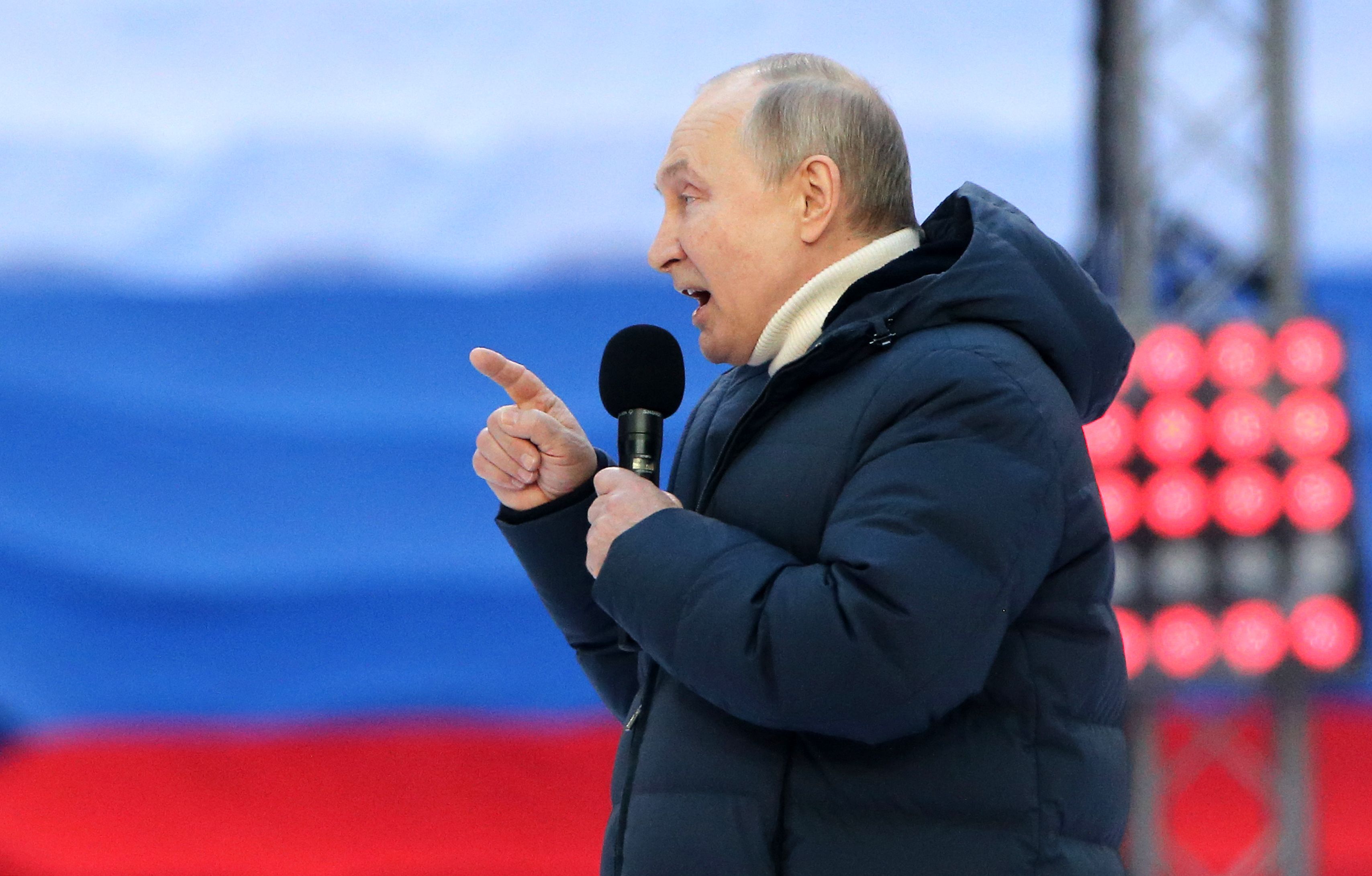 Russian President Vladimir Putin speaks during a concert marking the anniversary of the annexation of Crimea, on March 18, 2022 in Moscow, Russia. 