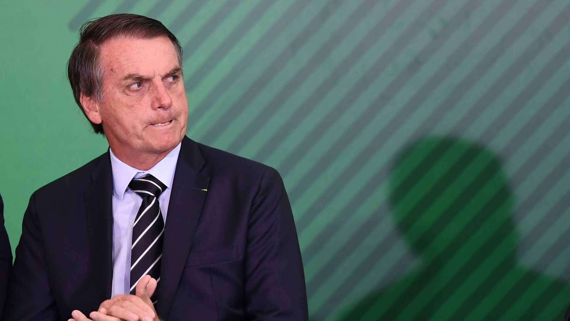 Jair Bolsonaro looks mad.