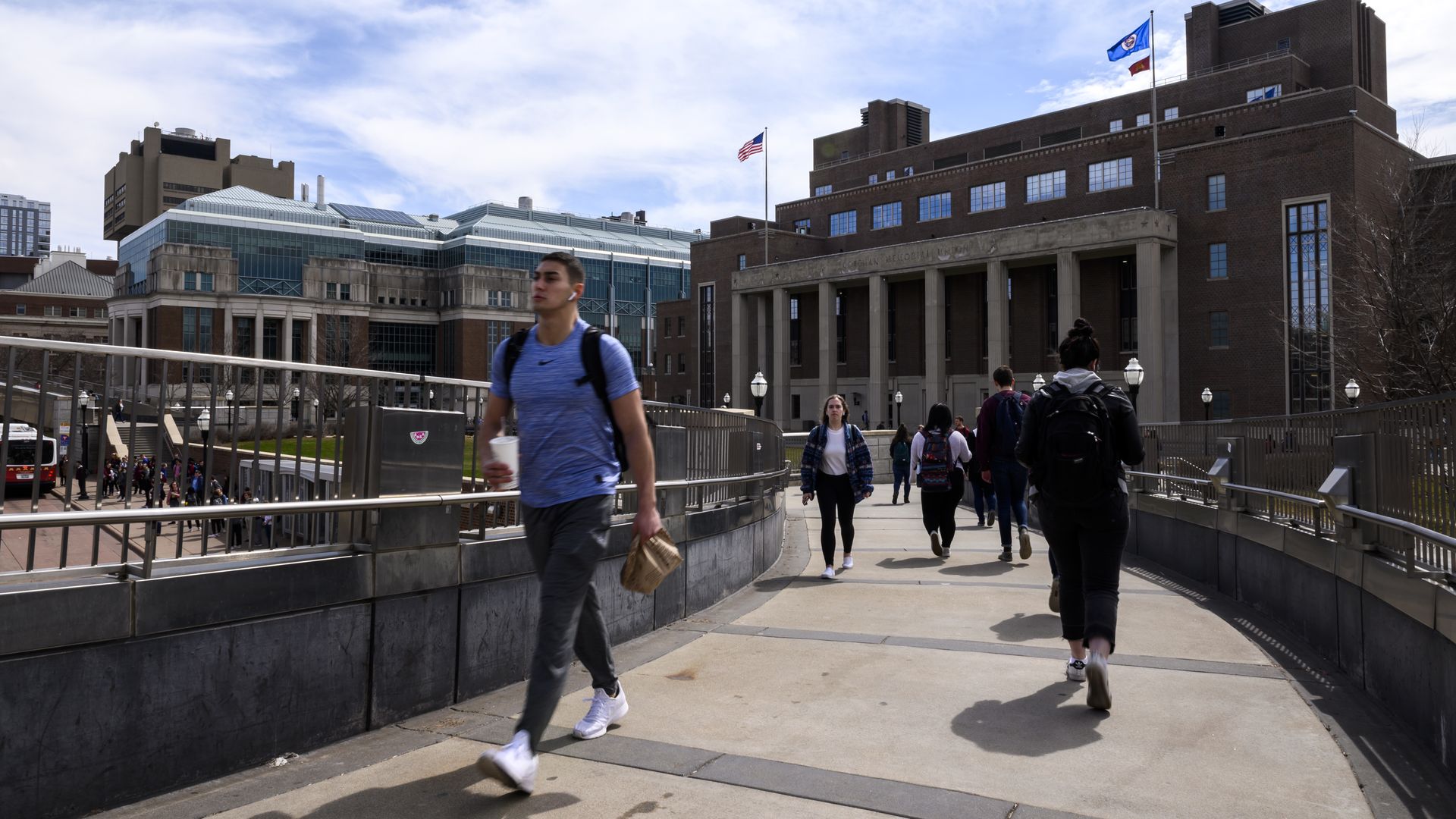 students walk at university of minnesota campus in minneapolis